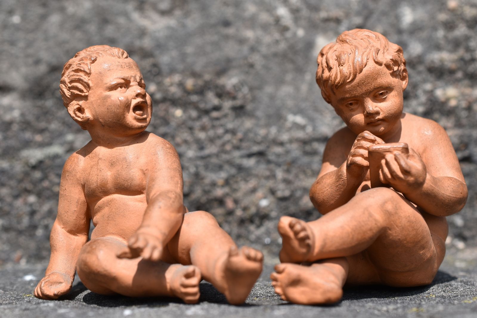 Pair Of Seated Terracotta Putti (Circa 1870)