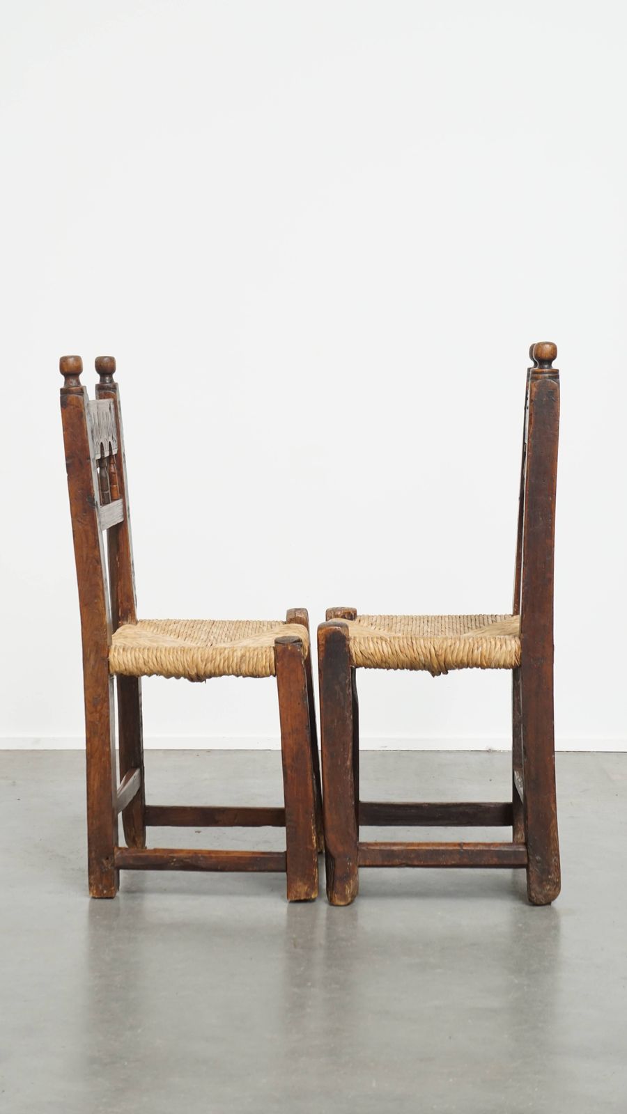 Nice Unique Set Of 2 Antique Spanish Farm Chairs With Woven Wicker Seat And Beautiful Wood Carving photo furniture