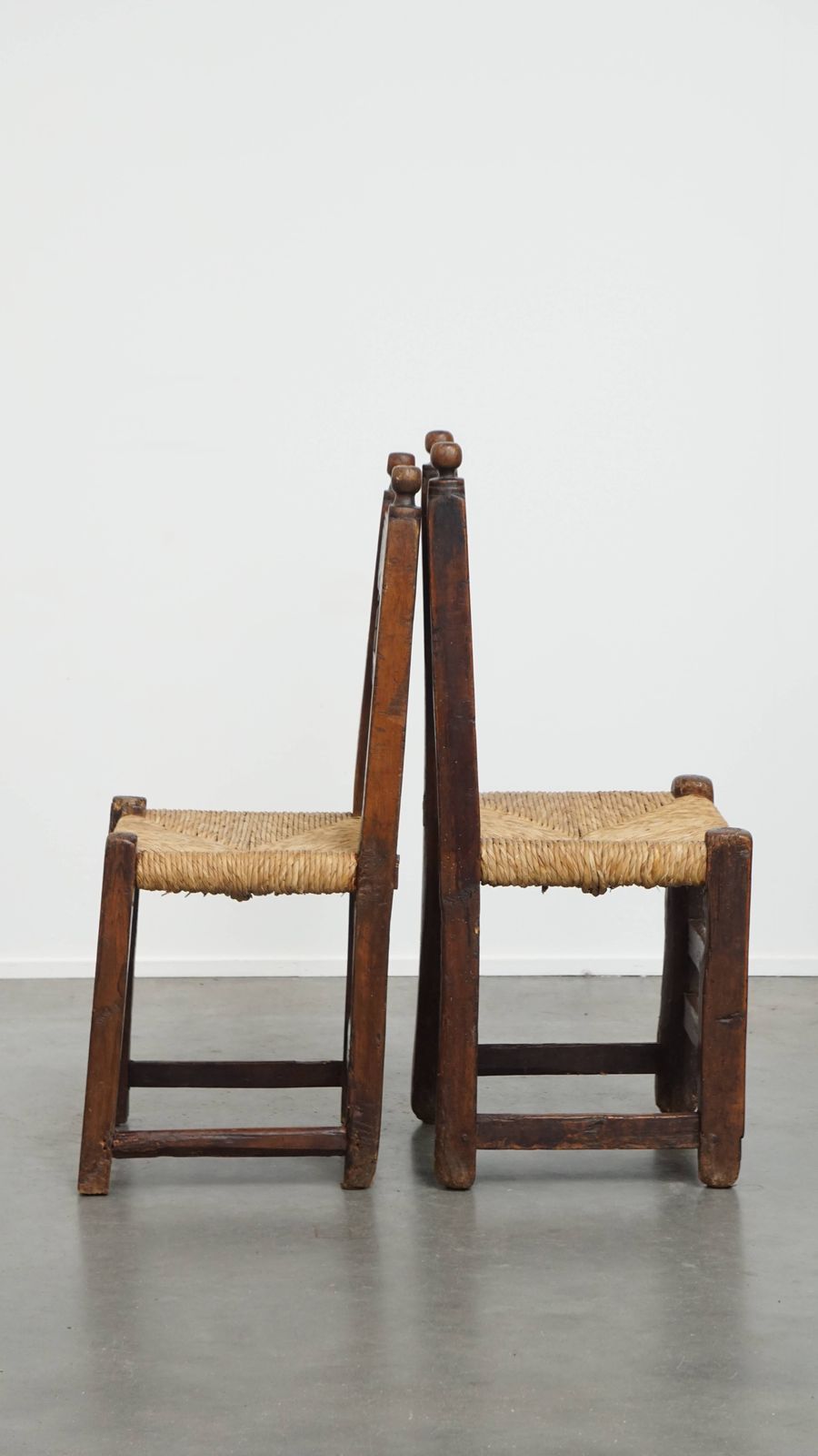 Unique Set Of 4 Antique Spanish Farm Chairs With Woven Wicker Seats And Beautiful Wood Carvings photo vinterior