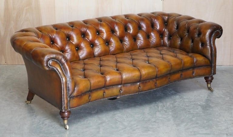 Fine Important Restored Pair Of Antique Howard & Sons Leather Chesterfield Sofas photo 55000.0