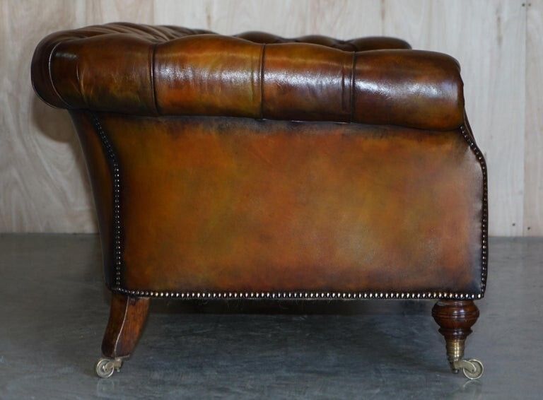 photo buy Fine Important Restored Pair Of Antique Howard & Sons Leather Chesterfield Sofas