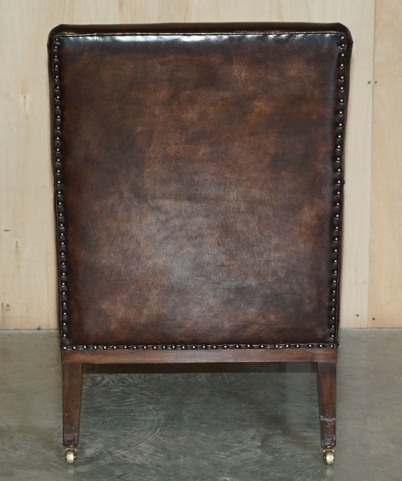photo furniture Pair Of Antique Regency  Brown Leather Chesterfield Armchairs Extending Stools