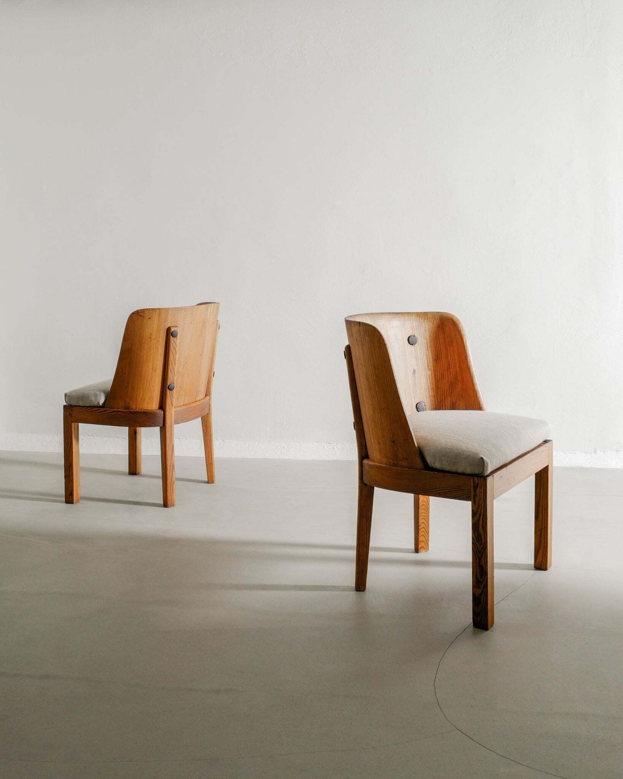 Pair Of Swedish Wooden "Lovö" Armchairs In Stained Pine By Axel Einar Hjorth For Nordiska Kompaniet Sweden, 1930s photo furniture