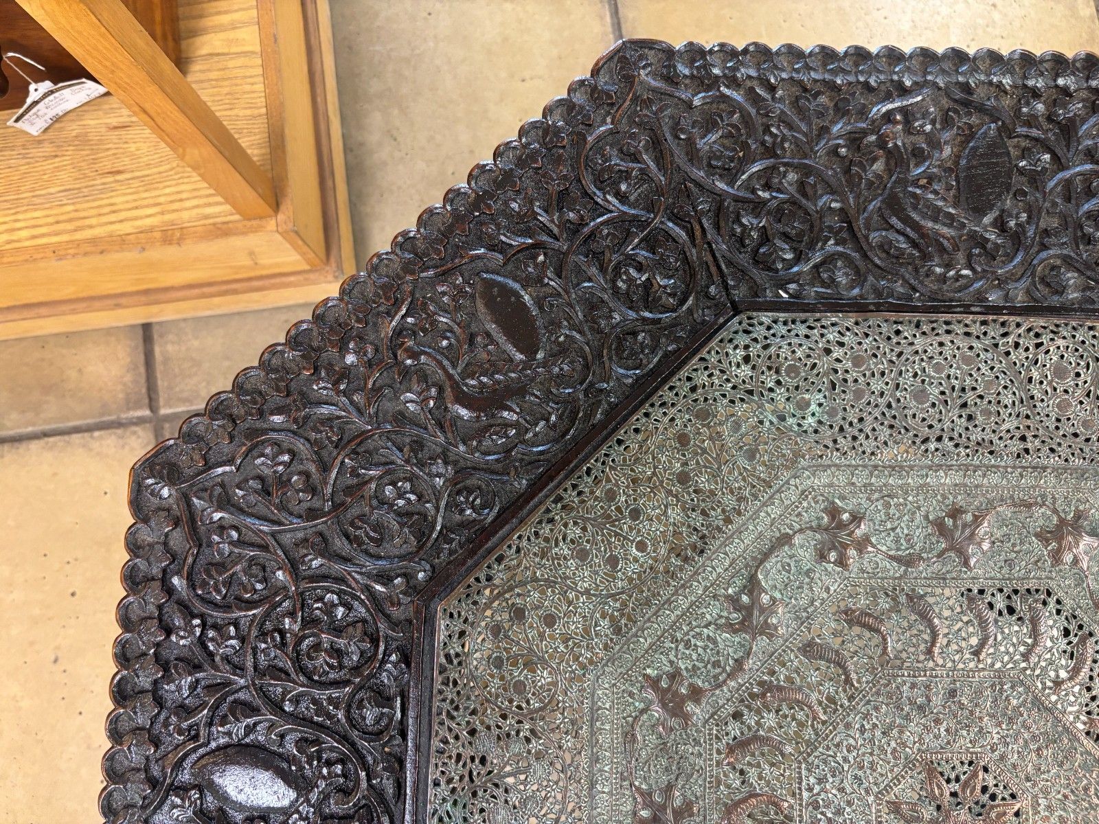 photo furniture 19th Century Anglo Indian Heavily Carved Wooden Table With Copper Insert