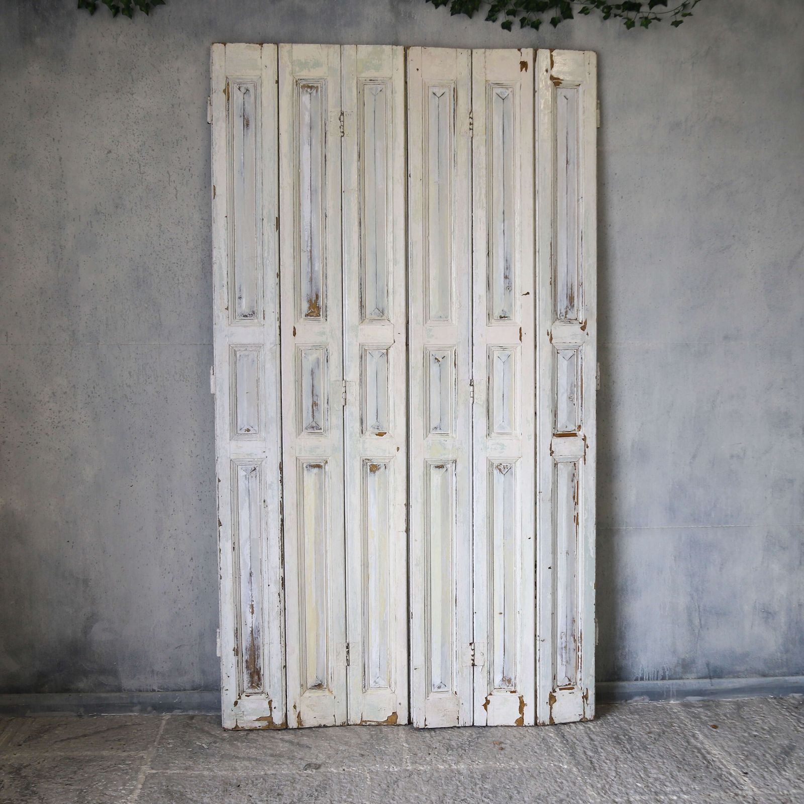 Pair Of Antique Panelled Tri Folding Shutters In Original Cream Paint photo buy