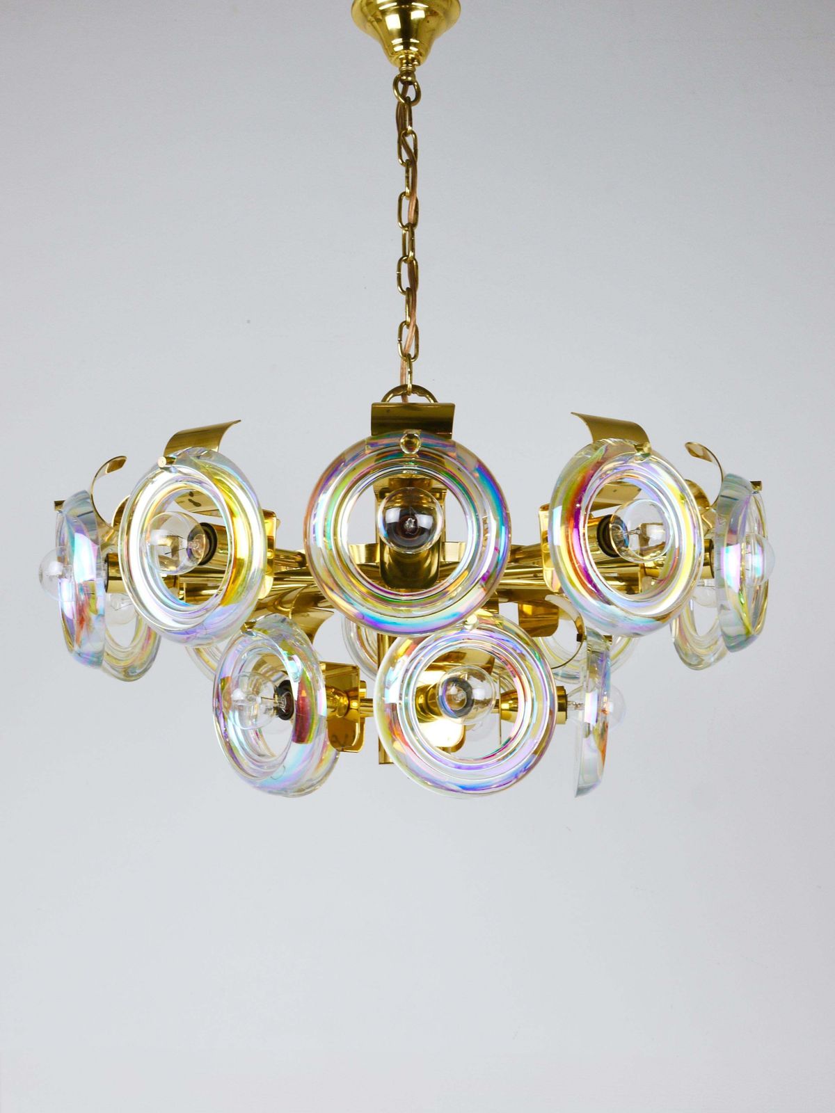 photo for sale Oscar Torlasco Large Brass Chandelier, Optical Rainbow Glass Rings, Italy, 1970s