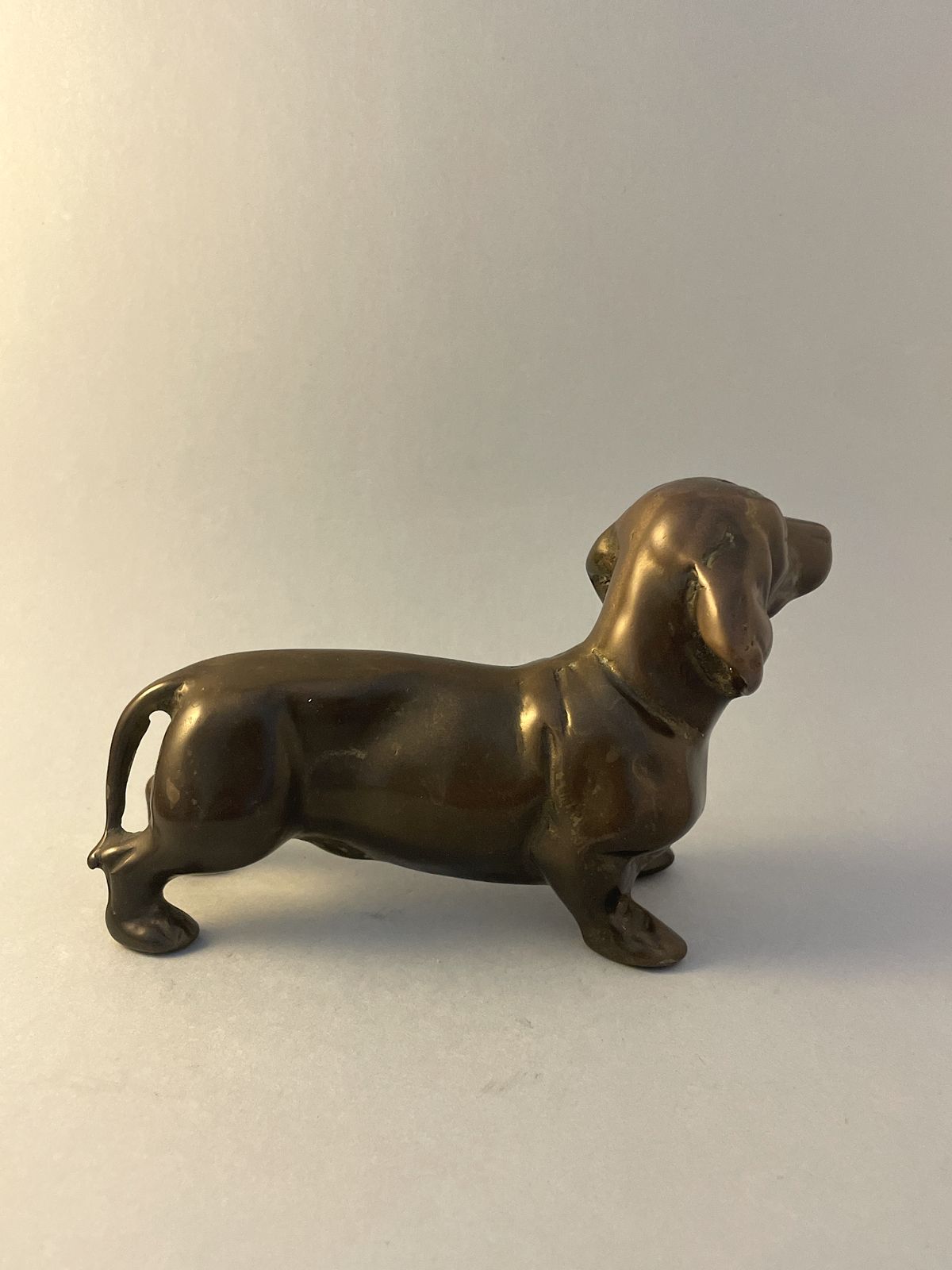 Bronze Sculpture Of A Dachschund, Vintage Heavy Metal Sausage Dog Ornament Statue photo vintage