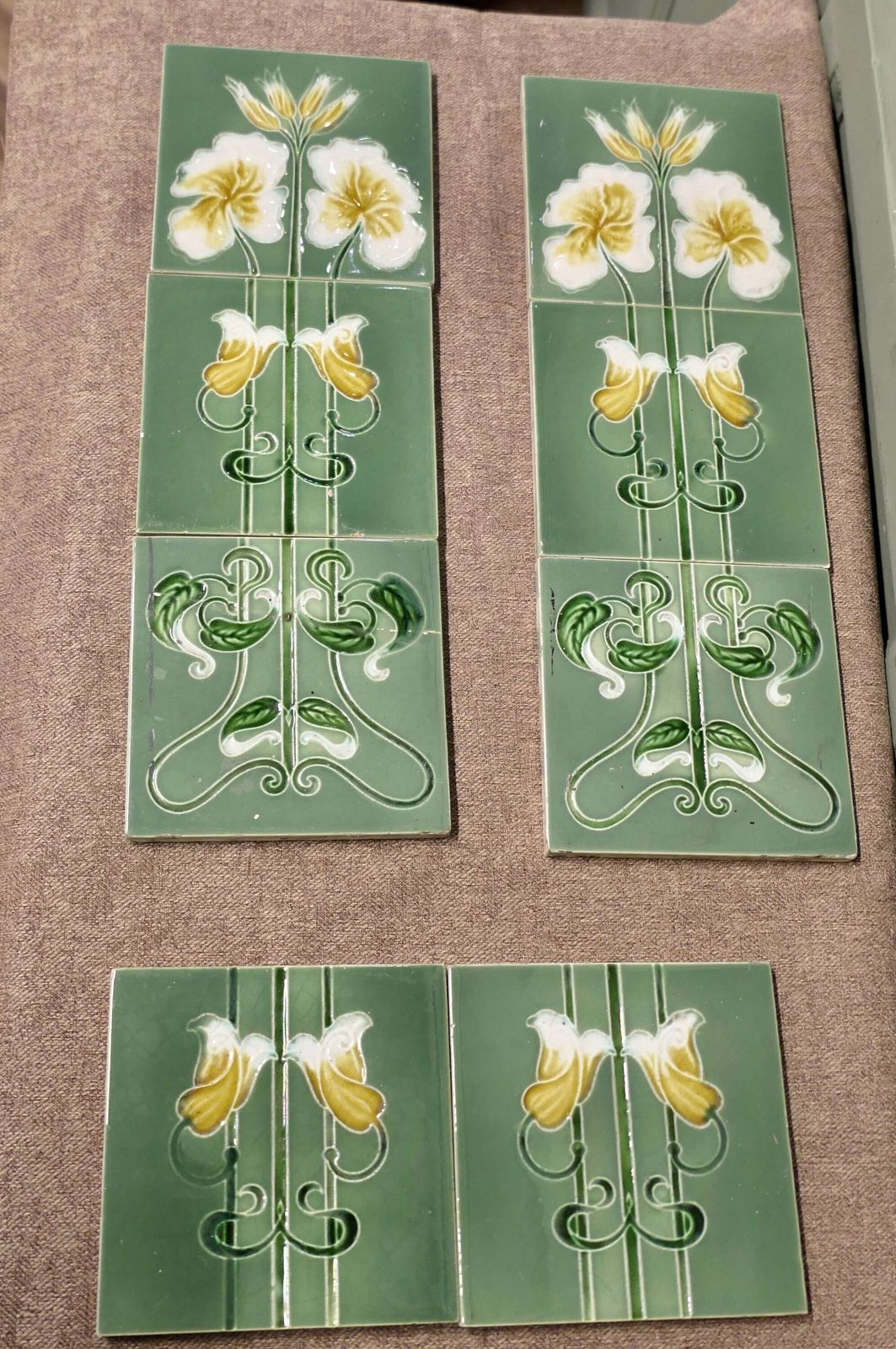 A Set Of 8 Art Nouveau Embossed Ceramic Tiles photo furniture