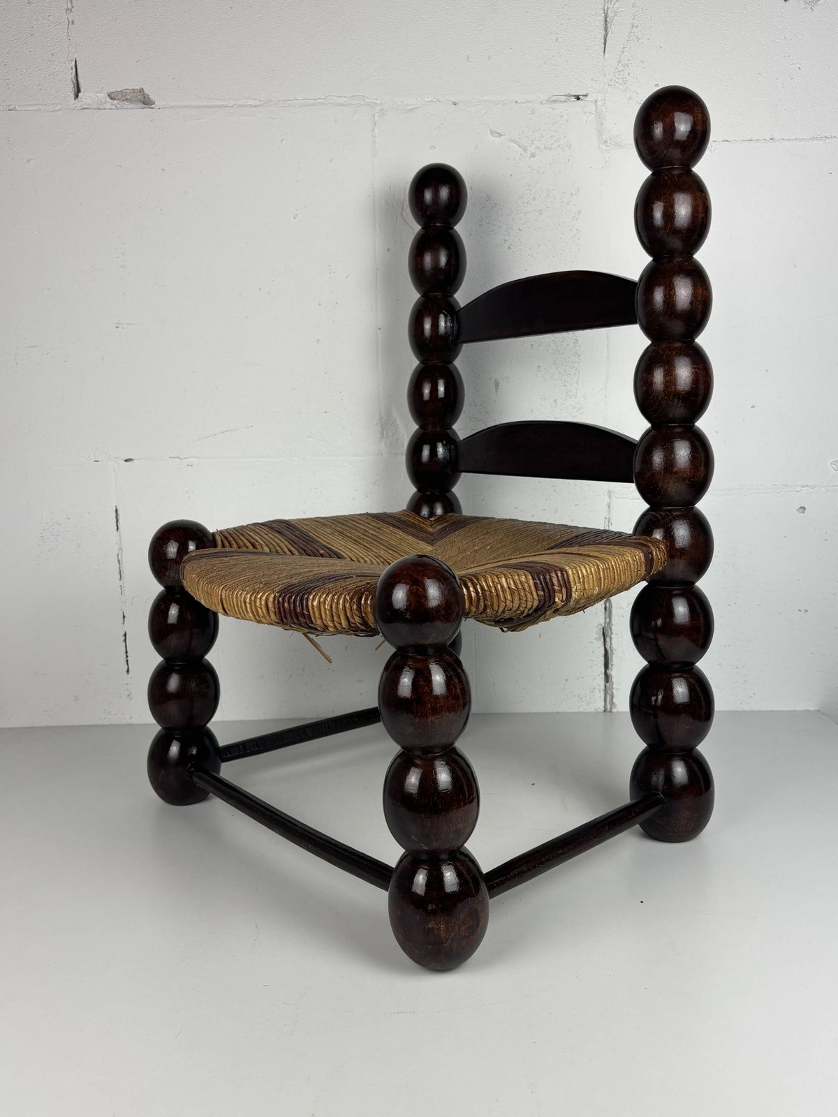 photo vintage Brutalist Wood Turned Bobbin Low Rush Chair N The Style Of Charles Dudouyt