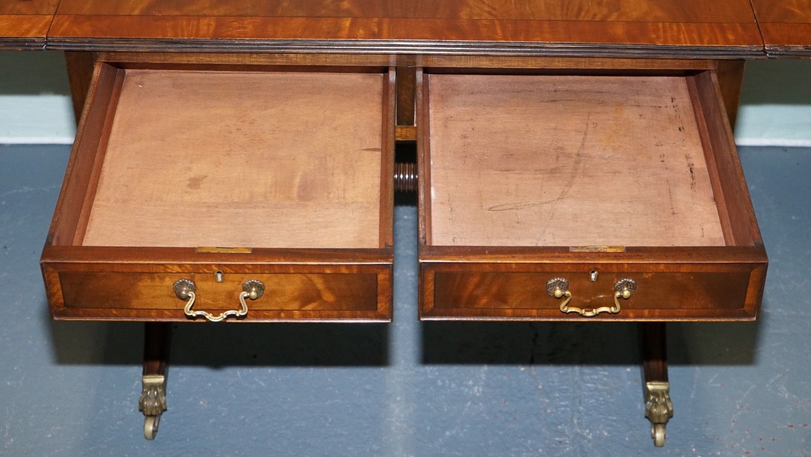 Furniture Vintage Hardwood Drop Leaf Side Table With Saber Legs And Brass Paw Feet photo