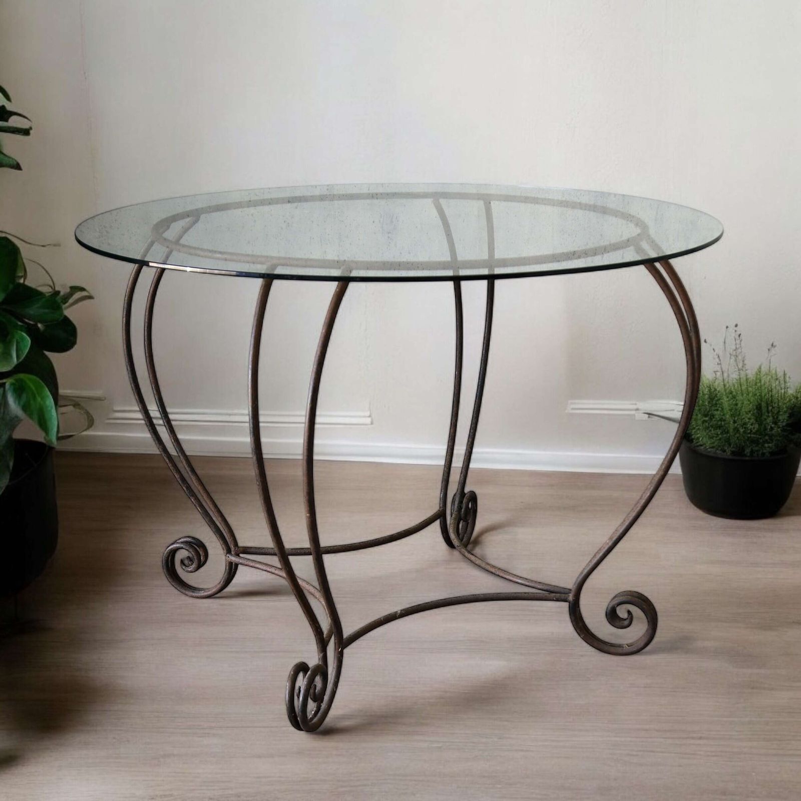 Stylish Mid Century Circular Table With Bevelled Glass Top And Decorative Metal Base photo furniture