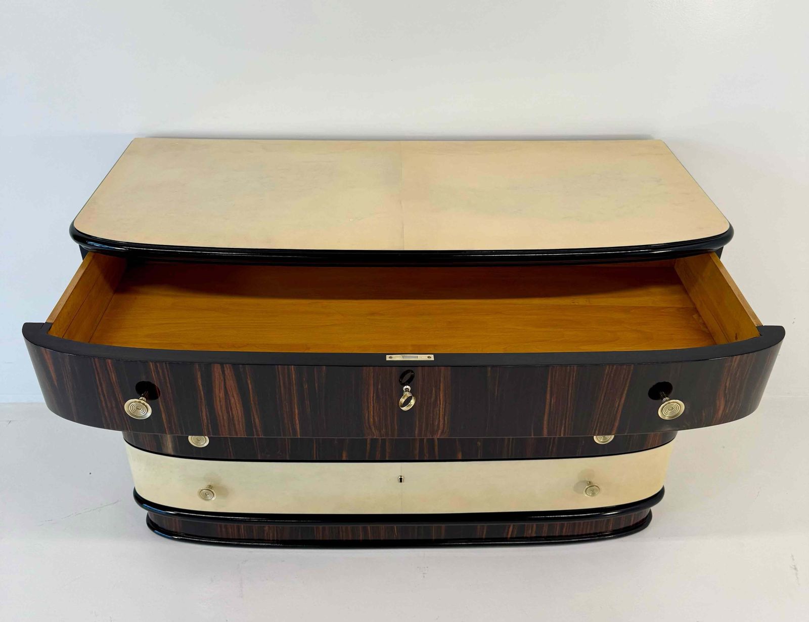Furniture Italian Art Deco Chest Of Drawers In Macassar And Parchment With Brass Handle, 1940s photo