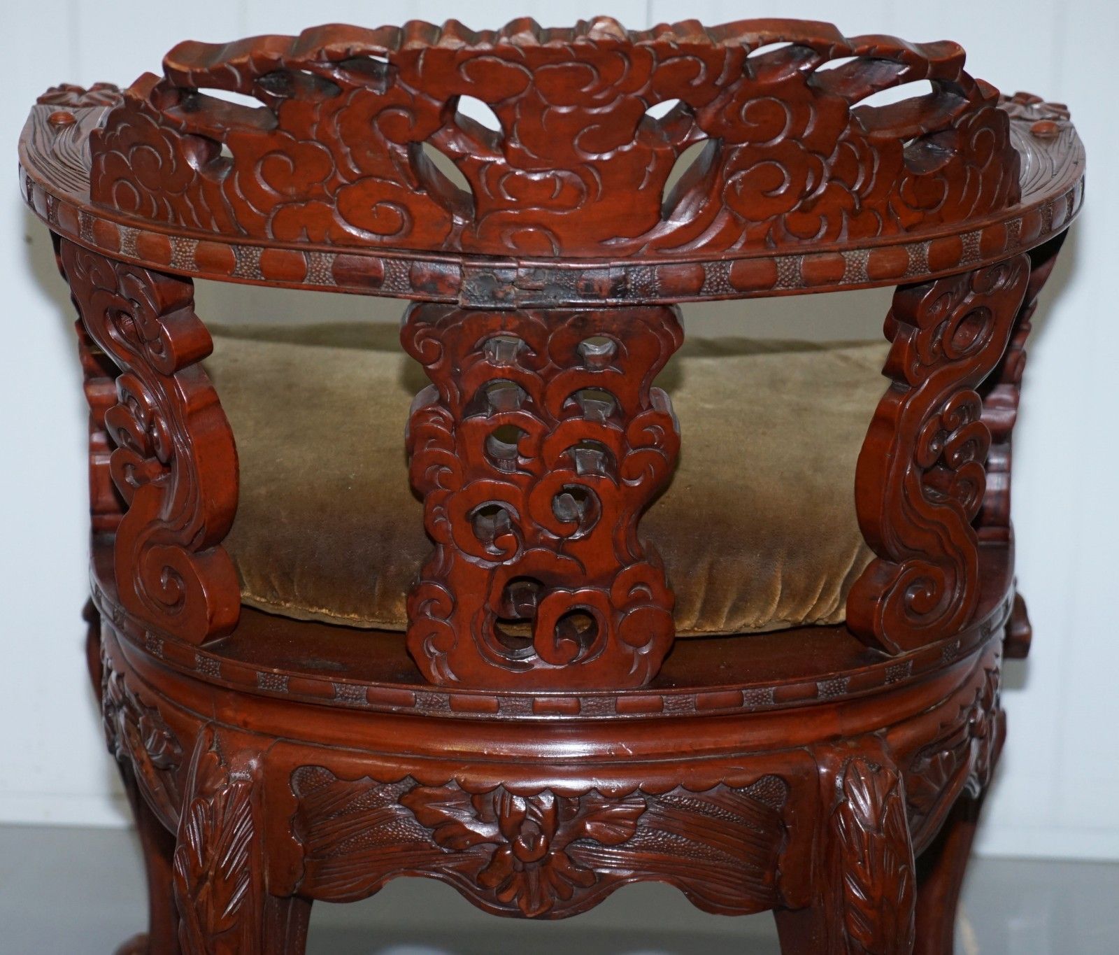 photo furniture Vintage Chinese Red Lacquered Carved Elm Armchair With Heavy Foliage Detailing