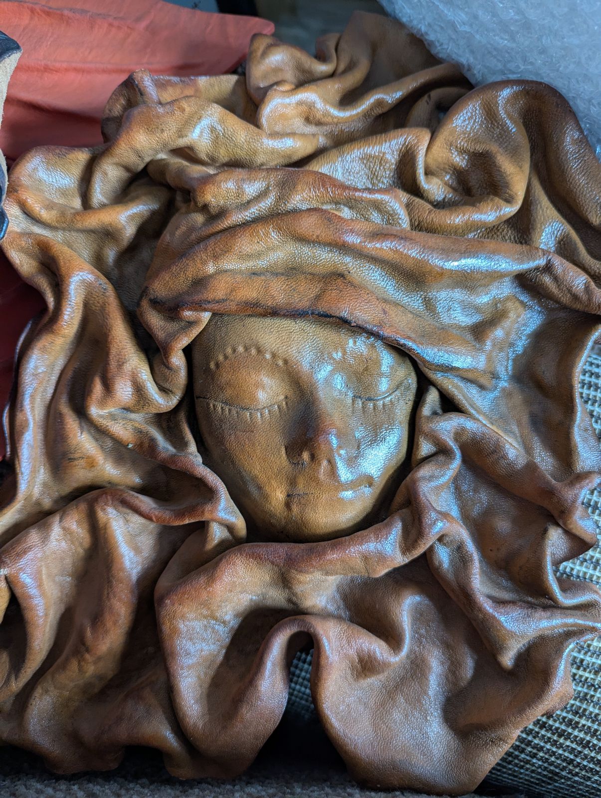 photo vintage The Silent Council – Seven Sculptural Leather Faces By Tch Piel, Dominican Republic