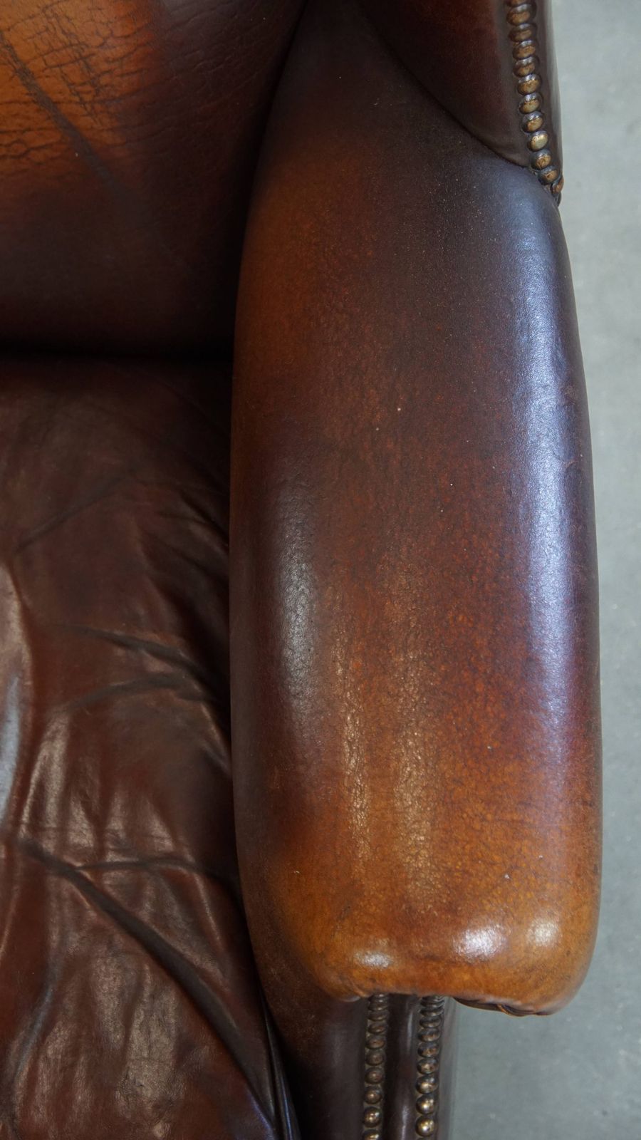 Luxurious, Classic And Comfortable Dark English Style Sheepskin Wing Chair With Lots Of Character And A Beautiful Patina photo vintage