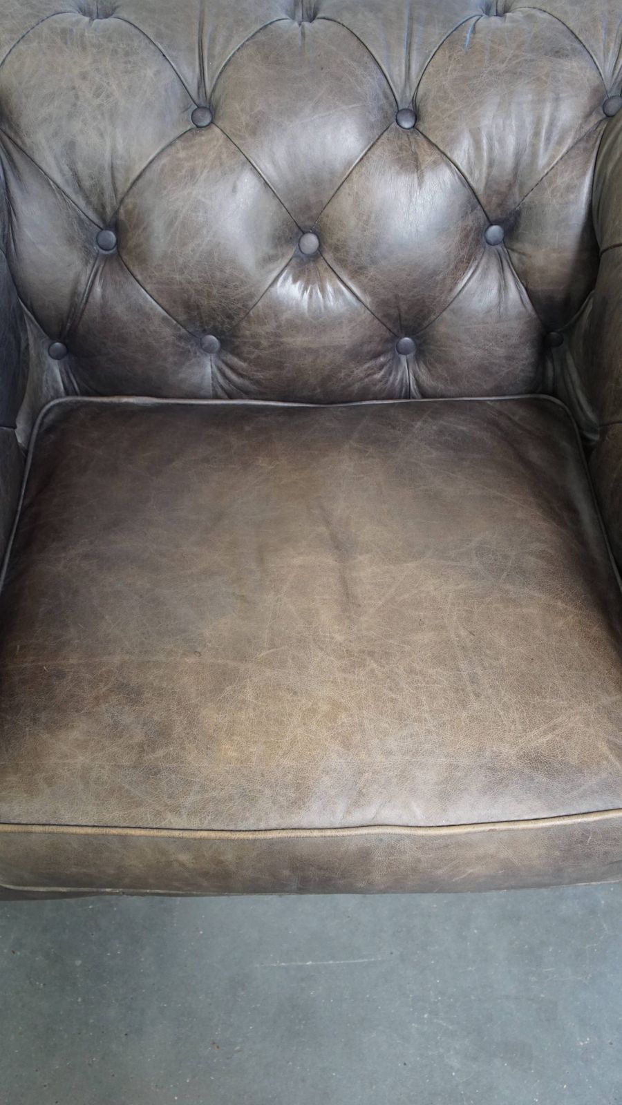Unique And Spacious Gray Cowhide Chesterfield Club Armchair In English Style On Wheels photo vinterior