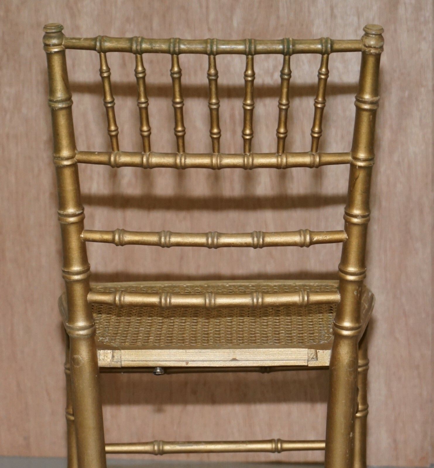 photo furniture Pair Of Edwardian Giltwood Famboo Regency Style Bergere Chairs With Gold Gilding