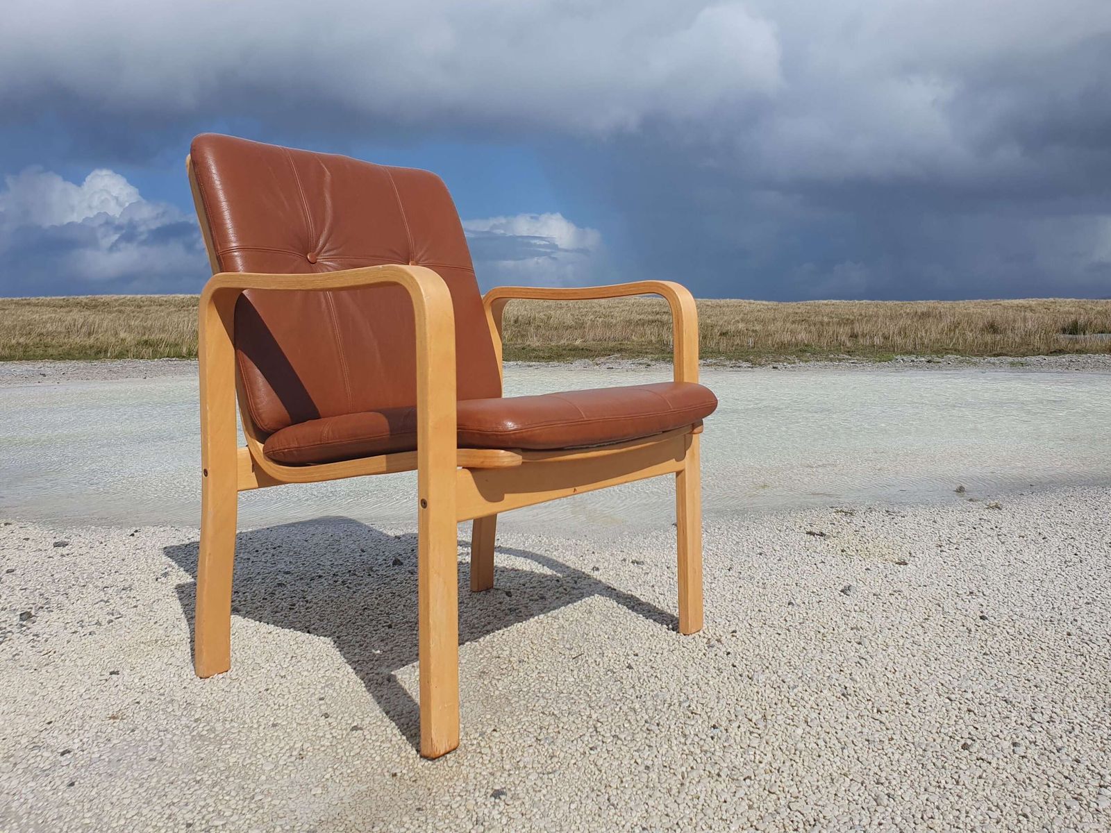Yngve Ekstrom For Skandi Form, Sweden. A Bentwood Armchair With Leather Upholstered Pads.