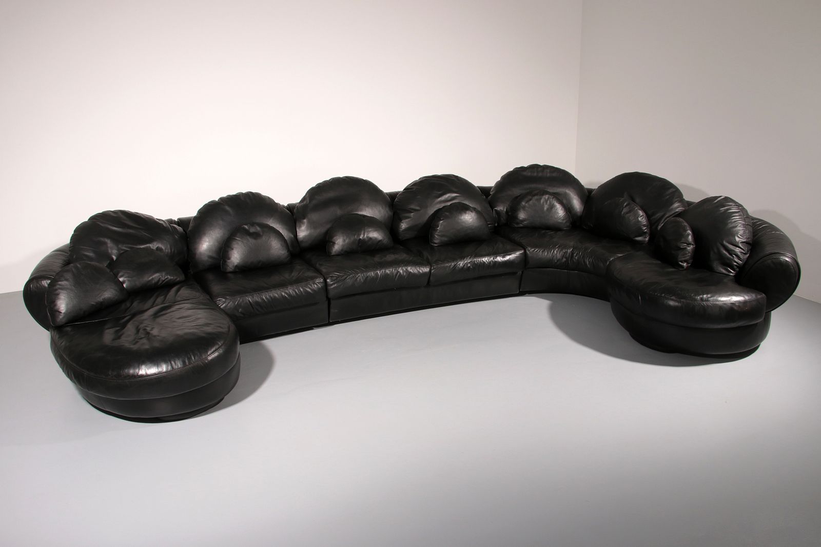 photo for sale Organically Shaped Post Modern Sectional Sofa In Black Leather