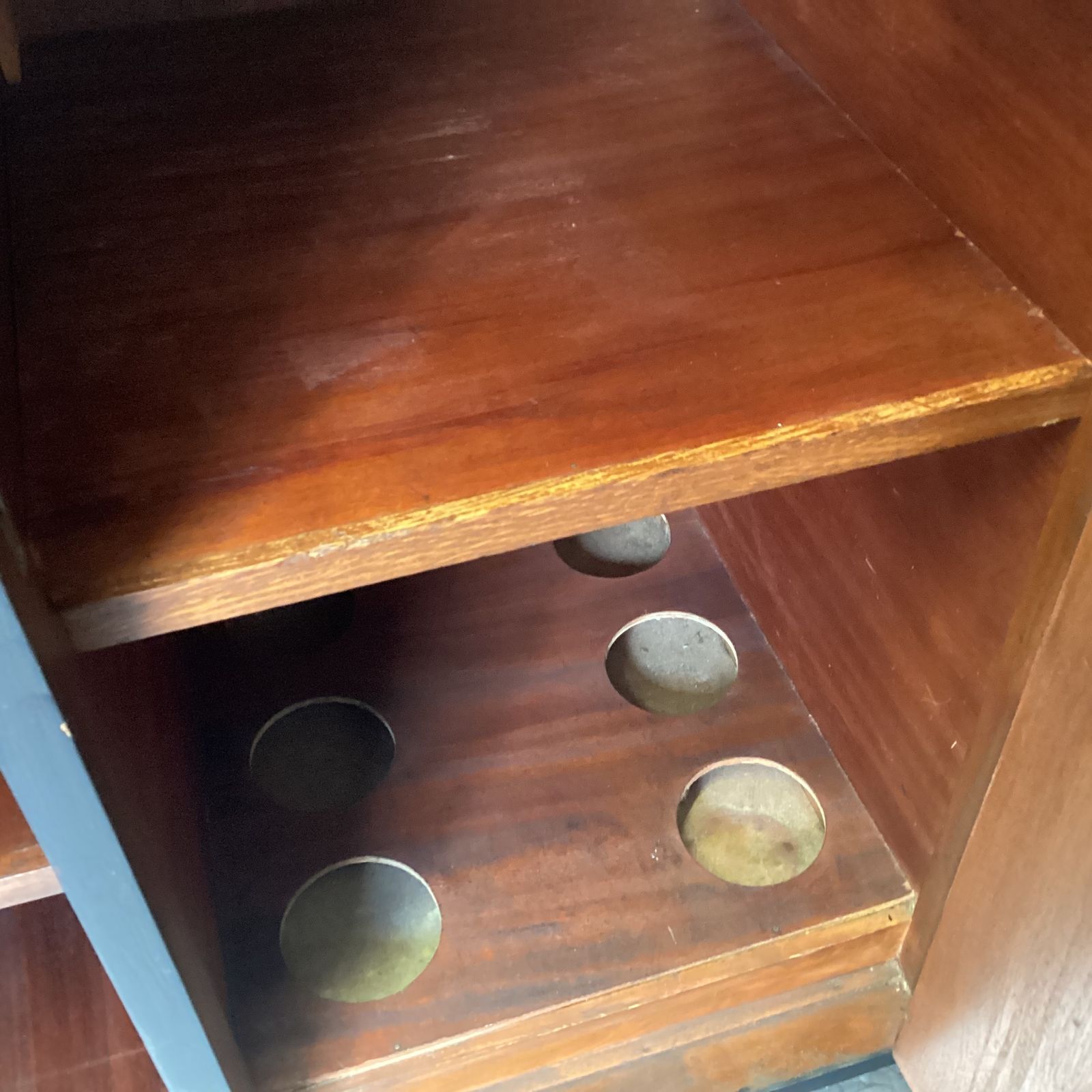 Art Deco Black And Gold Dresser With Gold  Detailing Interior Shelving And Bottle Storage photo vintage