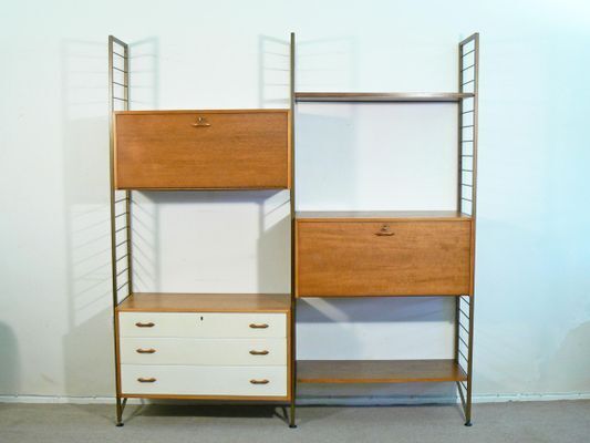 A Wall Leaning Gold Metal Ladderax System, C1960s