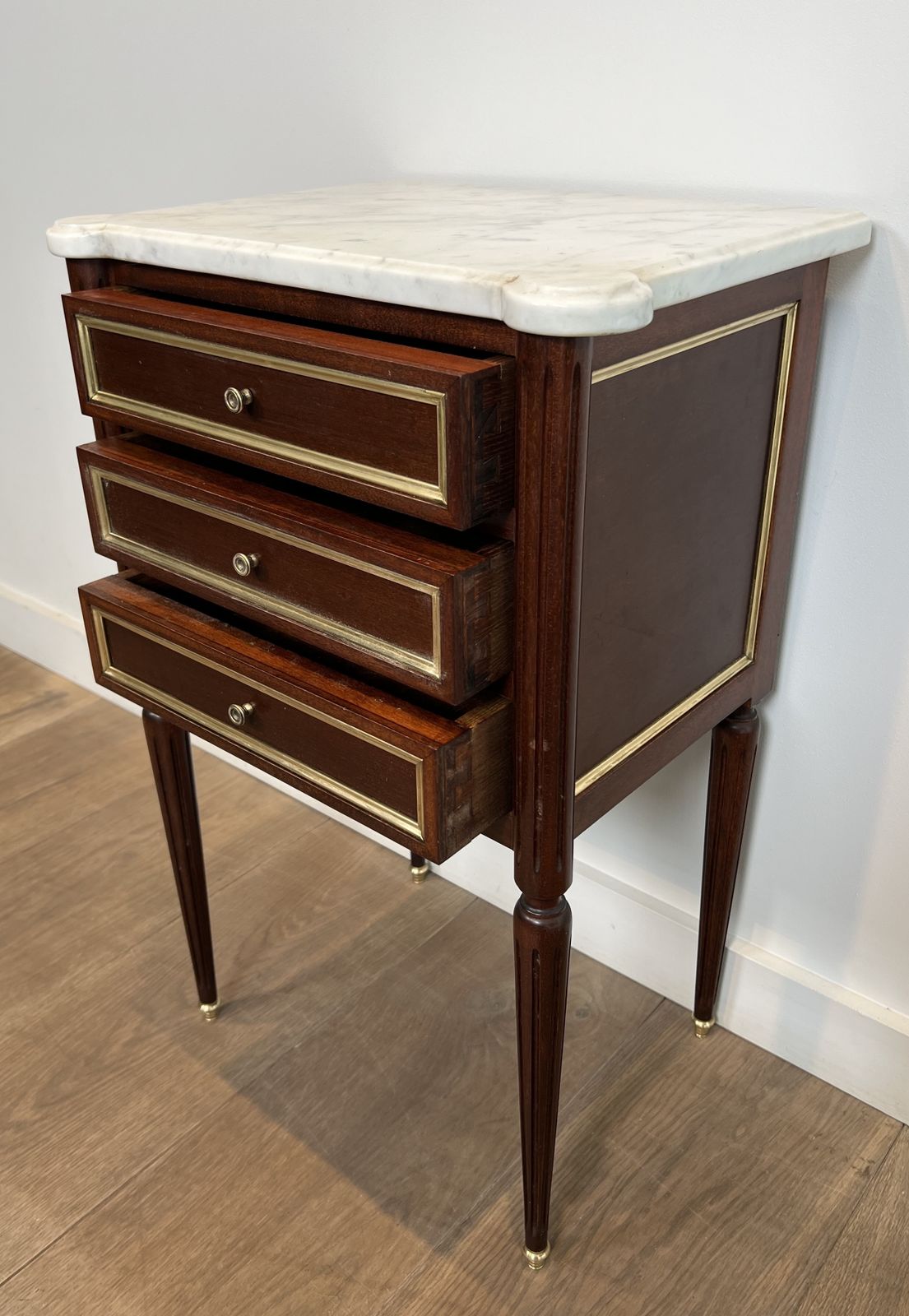 photo furniture Pair Of Mahogany And Brass End Tables Or Bedside Tables With Carrara Marble Tops In The Style Of Maison Jansen. Circa 1940