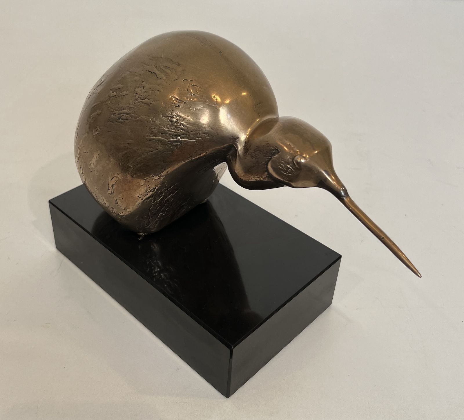 Bronze Sculpture Representing A Stylized Bird On A Black Marble Base, Signed And Numbered photo Art