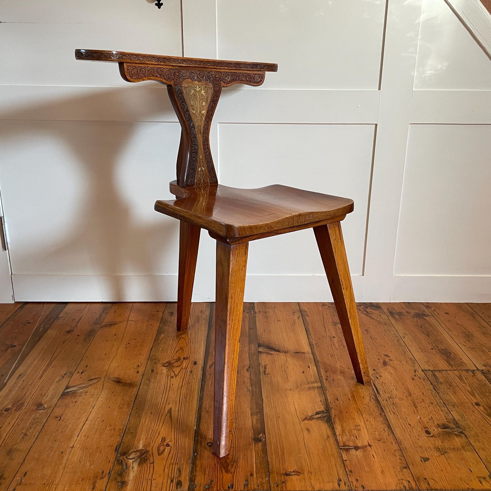 Vintage Wooden Hall Chair With Ornate Hand Carving And Brass Inlay Marquetry Spanish Moorish Revival Mid Century Accent Seating Three Legs photo furniture