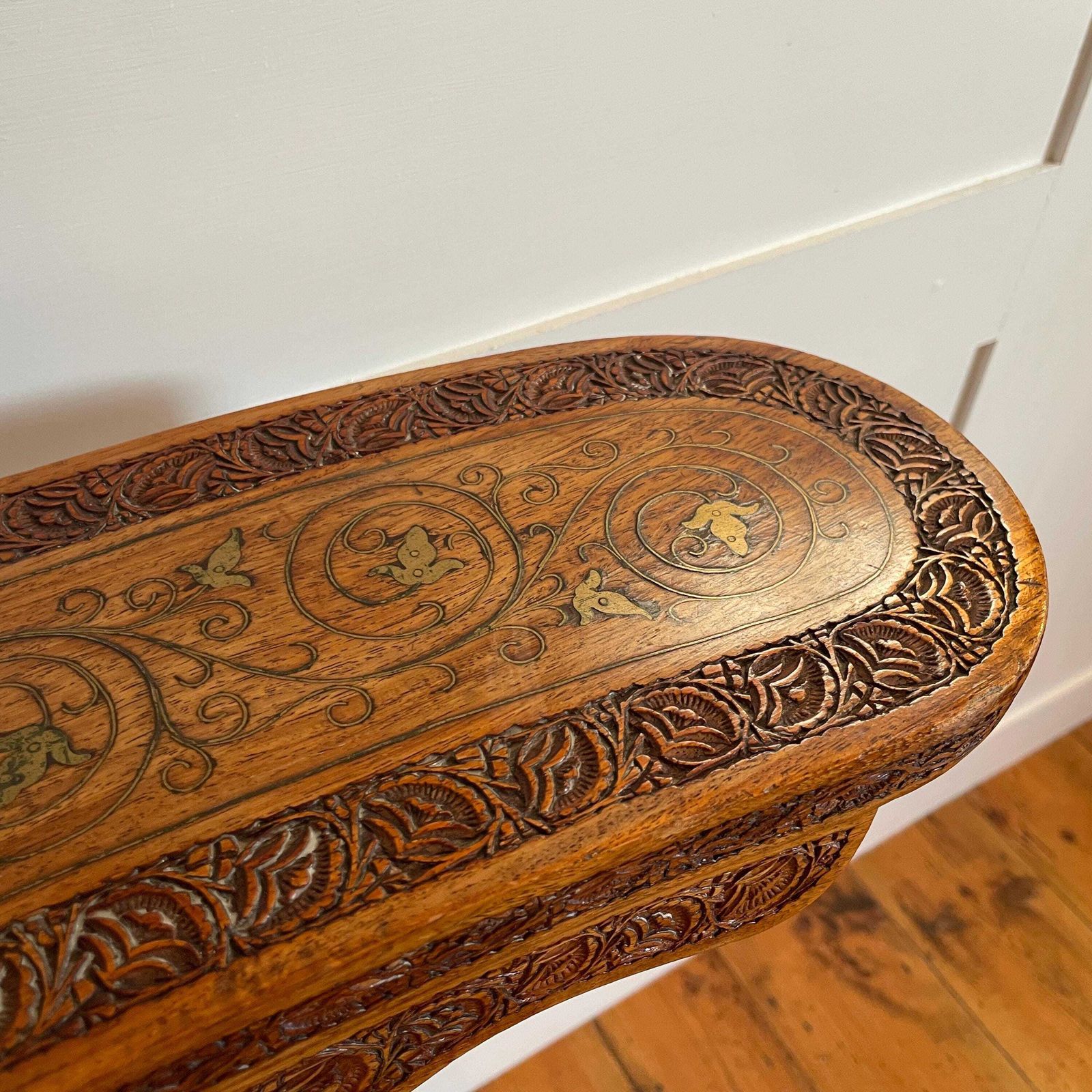 Vintage Wooden Hall Chair With Ornate Hand Carving And Brass Inlay Marquetry Spanish Moorish Revival Mid Century Accent Seating Three Legs photo vinterior