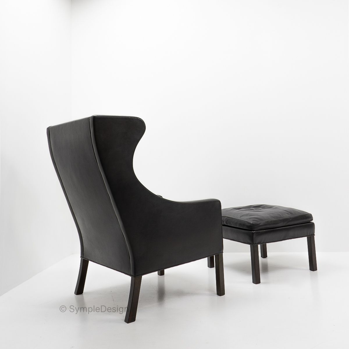 Black Leather Wingchair And Footstool By Borge Mogensen, 1960s photo 6500.0