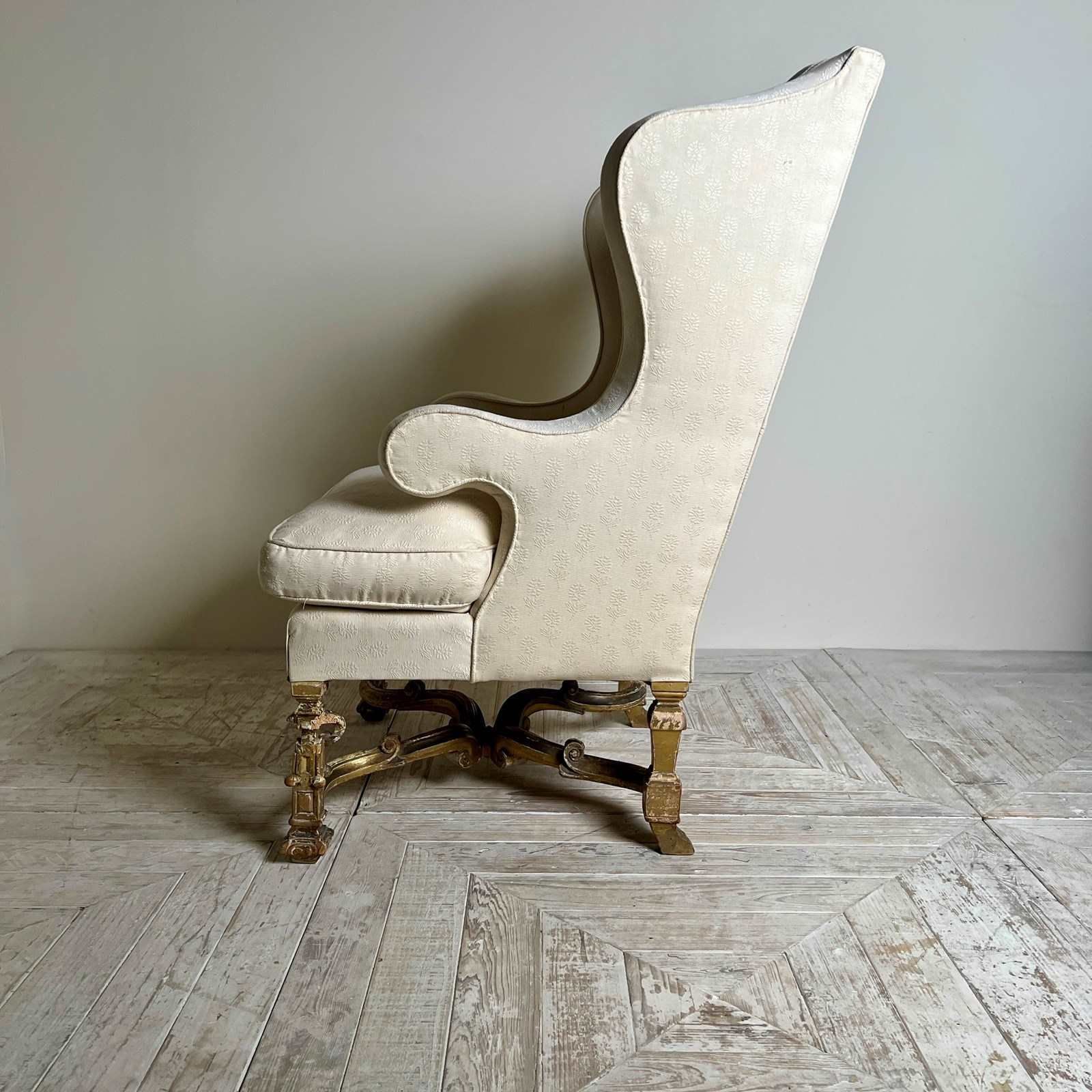 Antique Giltwood Wingback Armchair In The Late 17th Style photo for sale