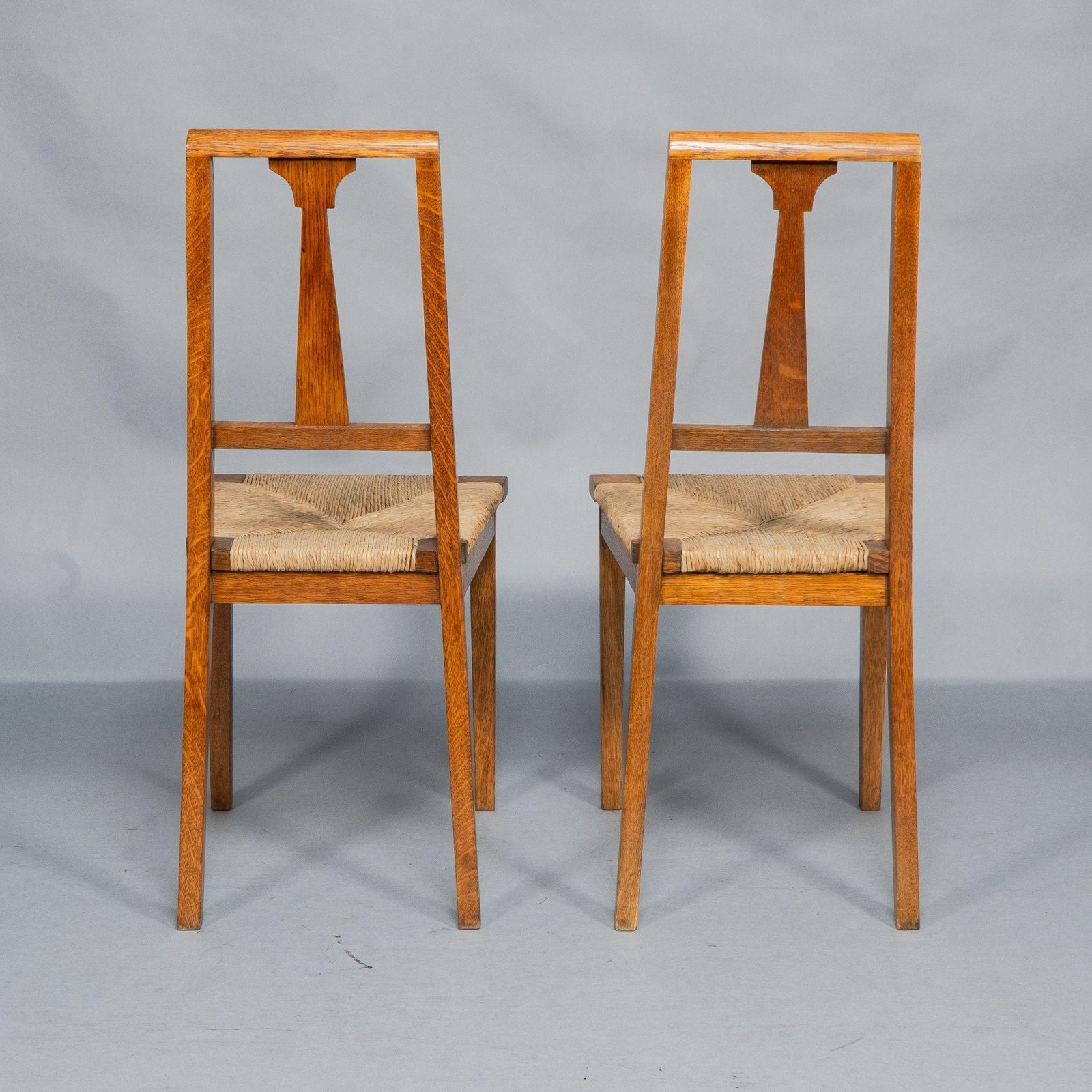 Wylie & Lochhead. Pair Of Arts & Crafts Oak Side Chairs photo for sale