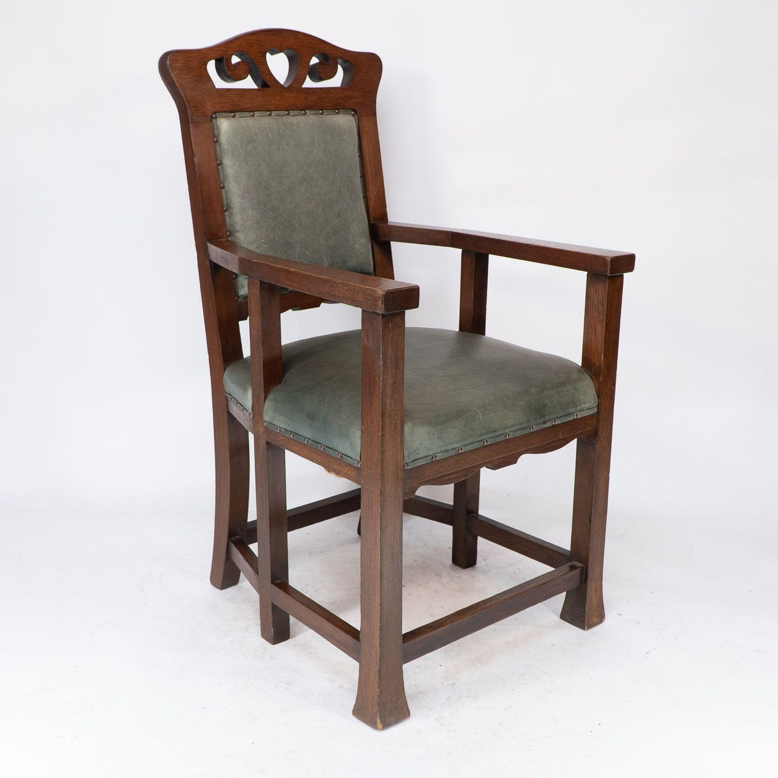 Heal And Son (Attributed). An Arts And Crafts Six Legged Oak Armchair photo furniture