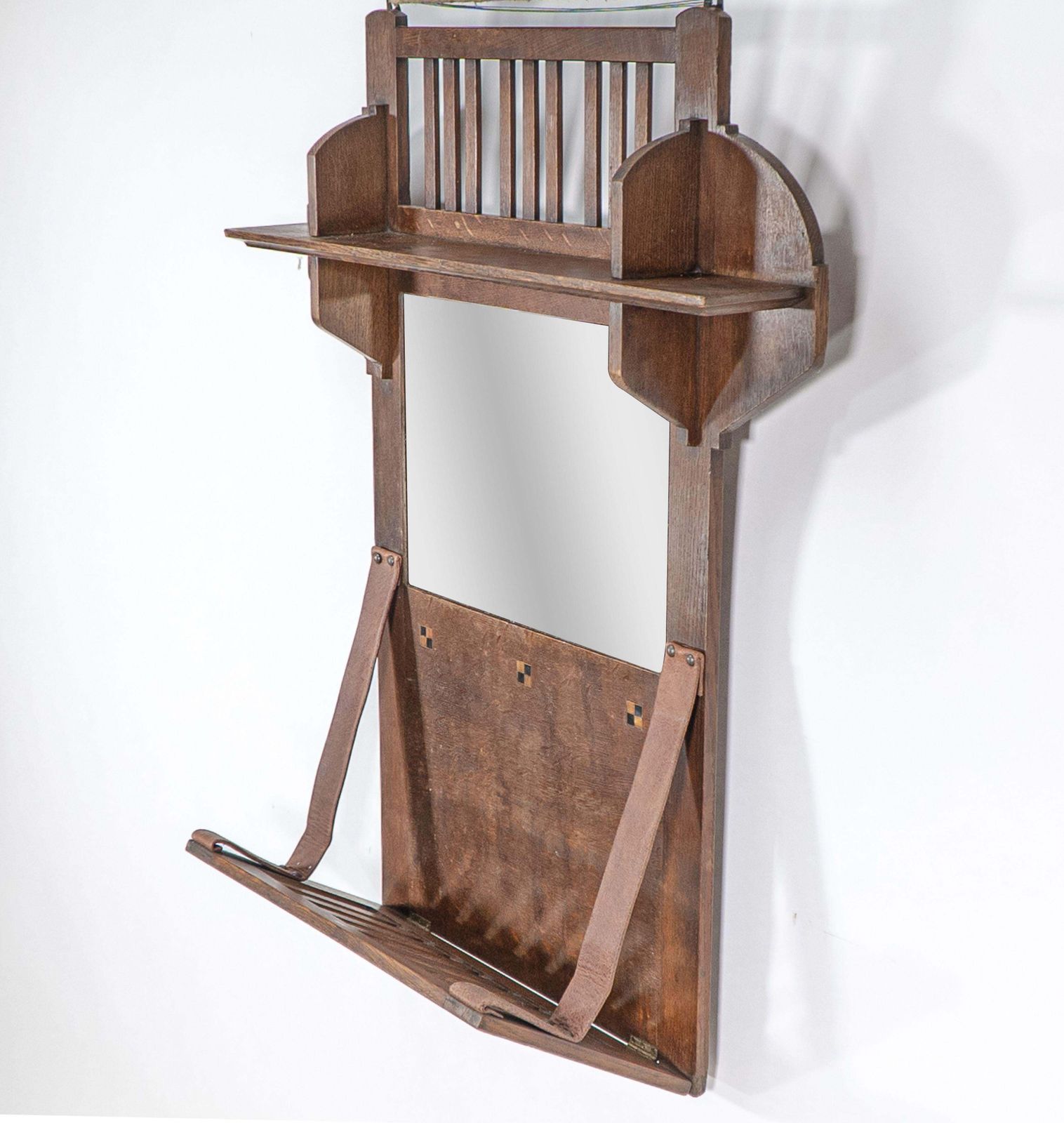 Liberty And Co. An Arts & Crafts Oak Hanging Paper Rack With Central Mirror photo furniture