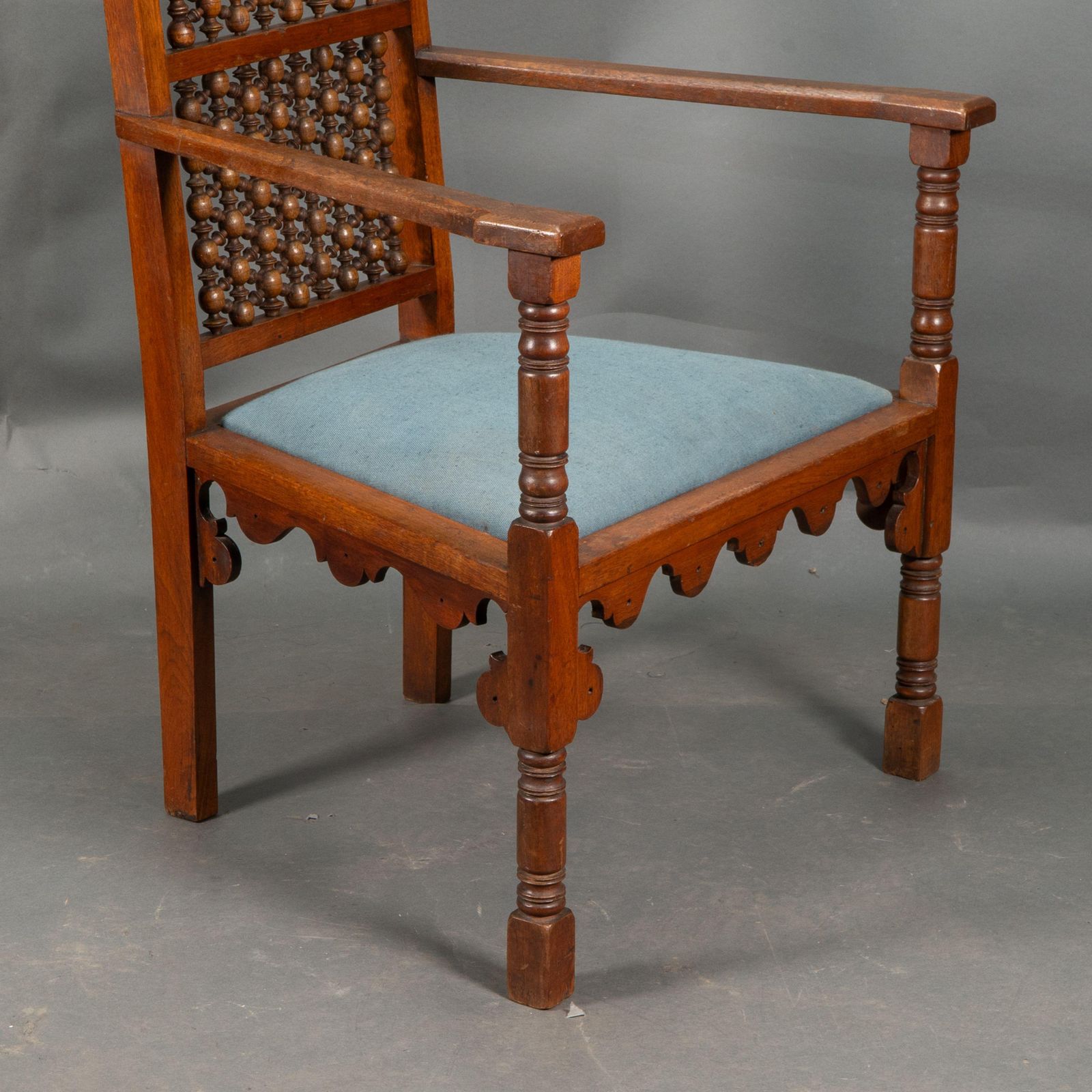 photo furniture DR C Dresser, Attributed. A Moorish Style Walnut Armchair