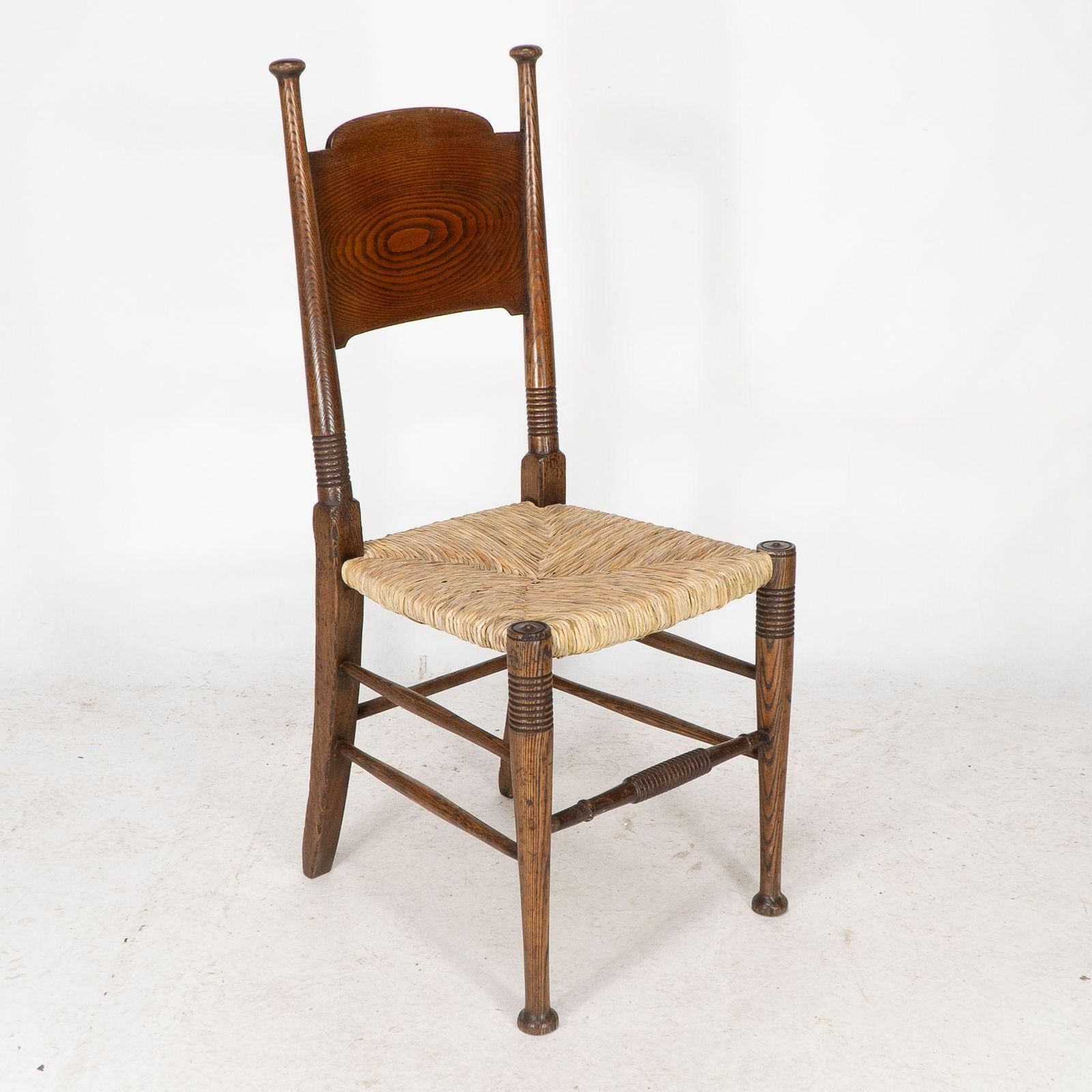 William Birch For Liberty & Co. A Pair Of Arts & Crafts Rush Seat Oak Chairs photo for sale