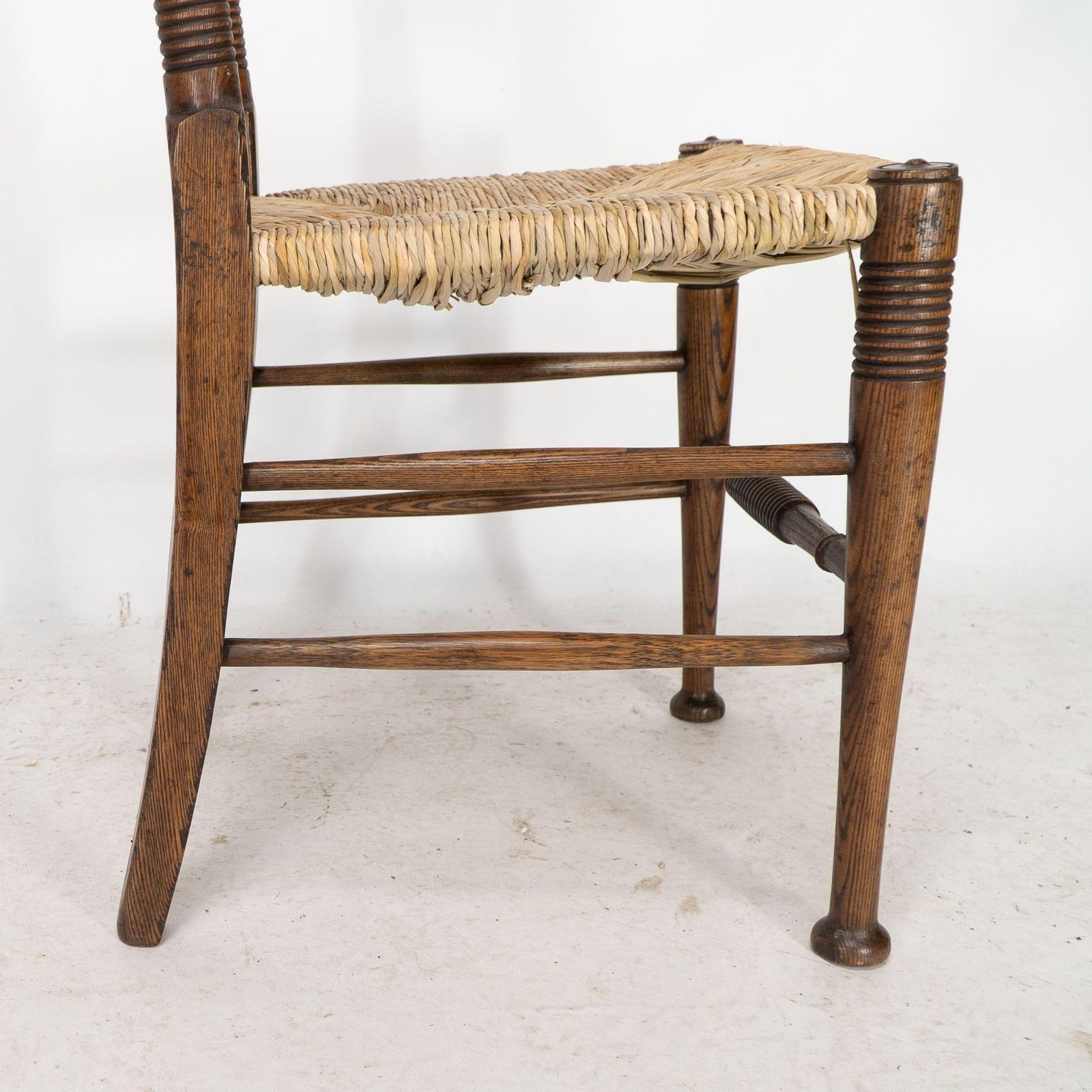 2200.0 William Birch For Liberty & Co. A Pair Of Arts & Crafts Rush Seat Oak Chairs photo