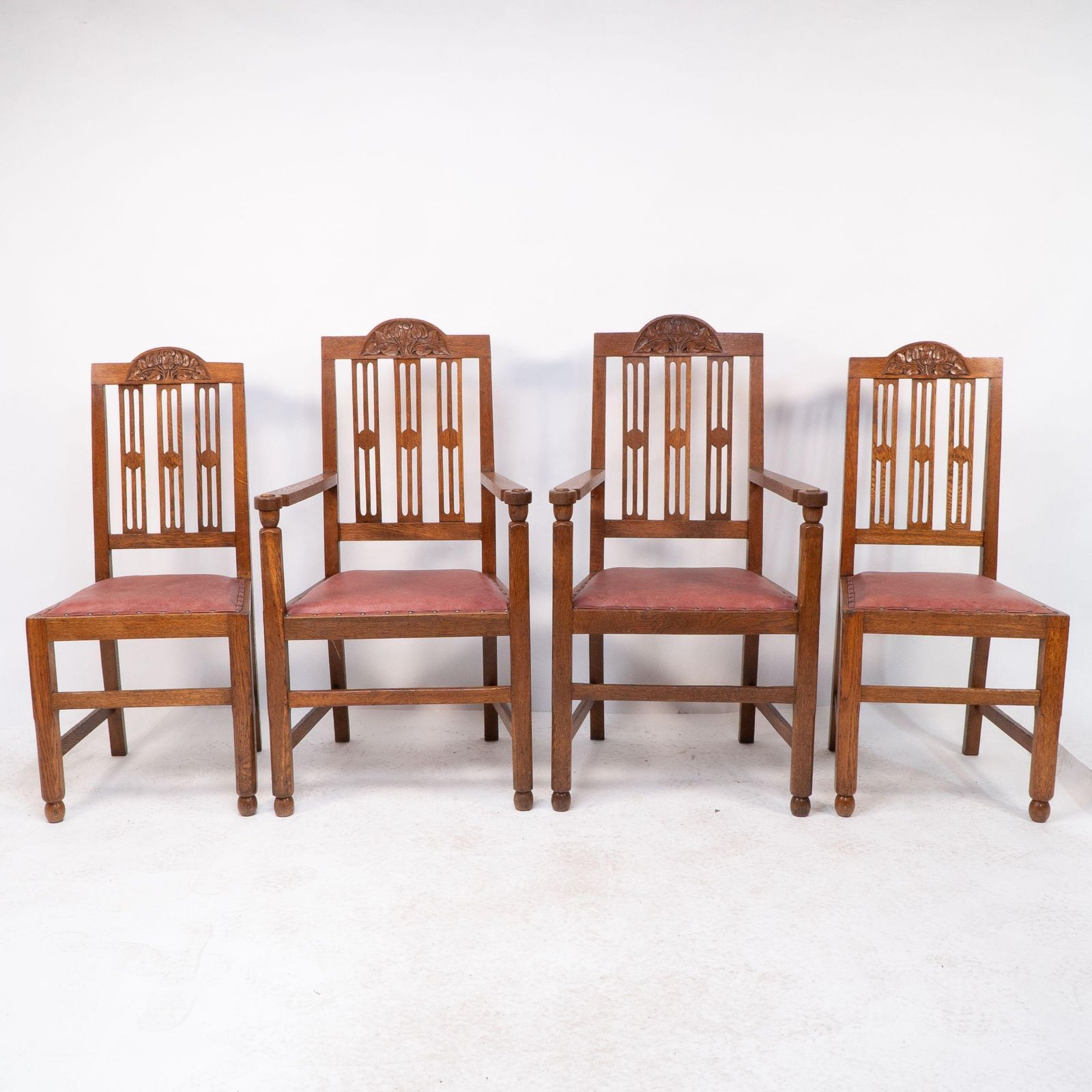 A Set Of Four Arts And Crafts Dining Chairs With Nicely Carved Floral Decoration photo furniture