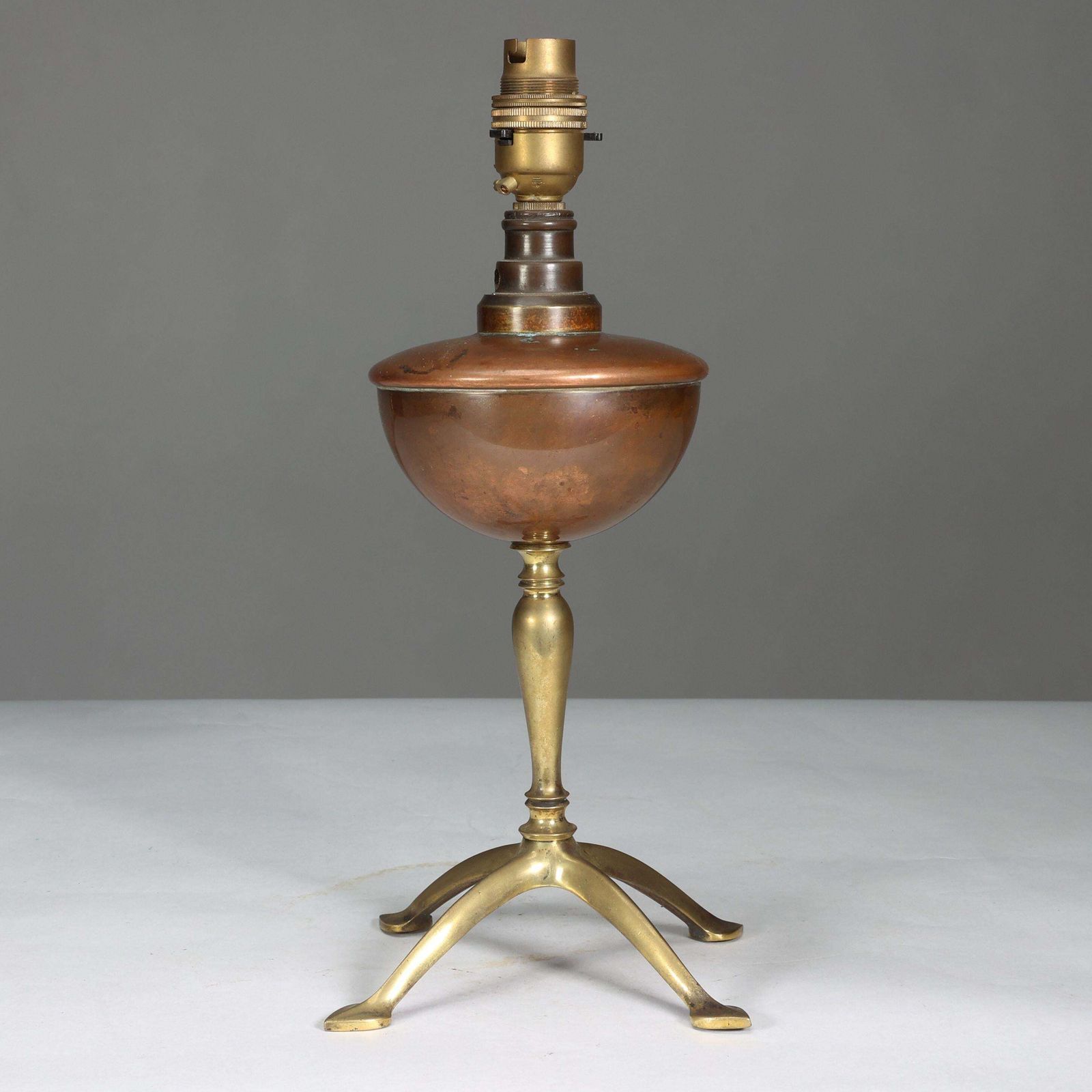Was Benson. An Arts And Crafts Four Leg Table Oil Lamp Converted To Electricity photo furniture