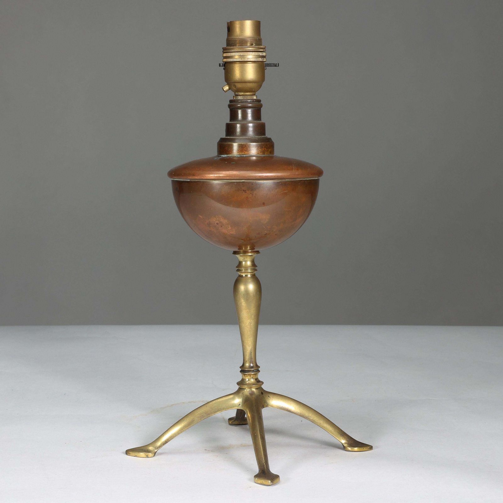 Was Benson. An Arts And Crafts Four Leg Table Oil Lamp Converted To Electricity photo for sale