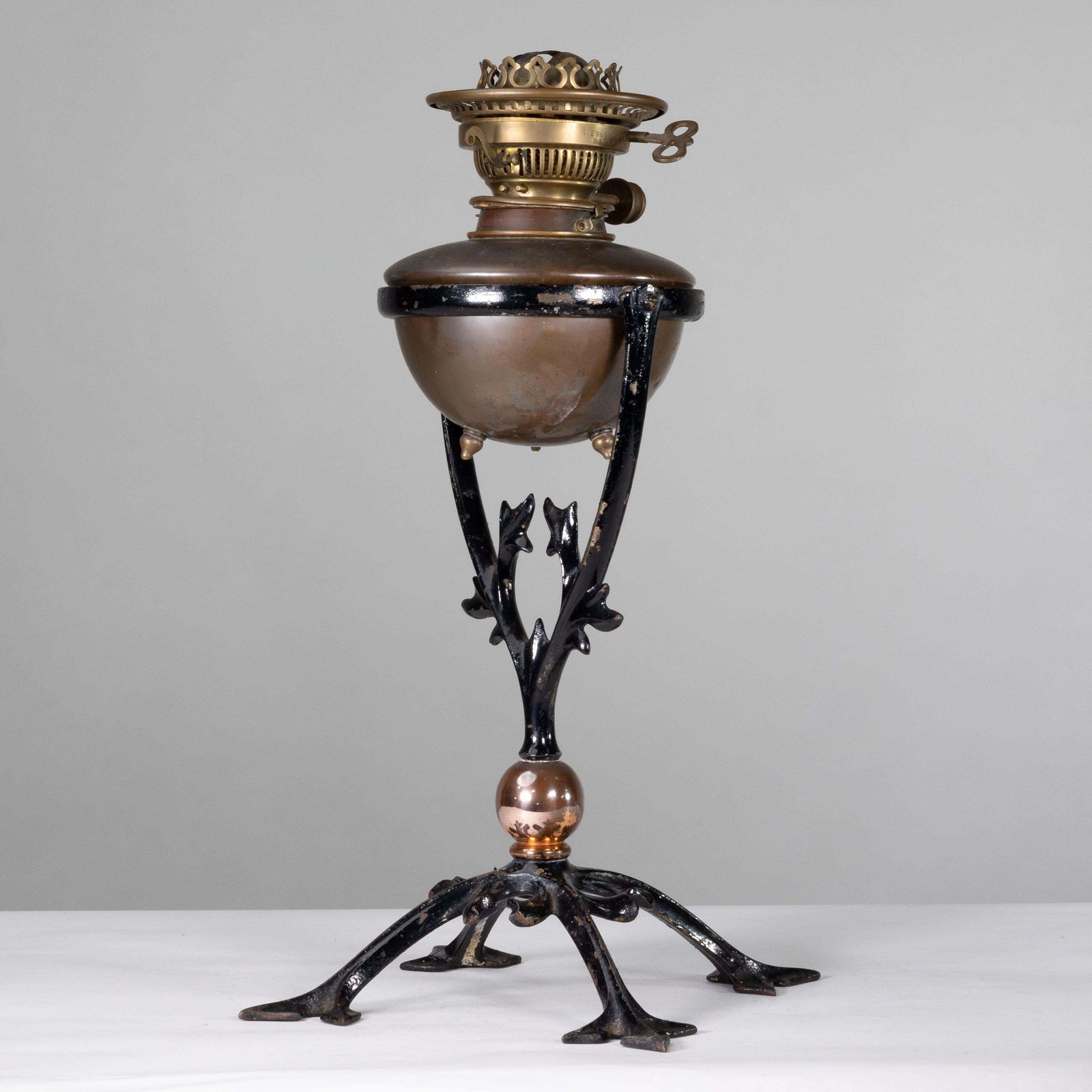 Was Benson. An Arts And Crafts Cast Iron Four Leg Table Oil Lamp photo for sale