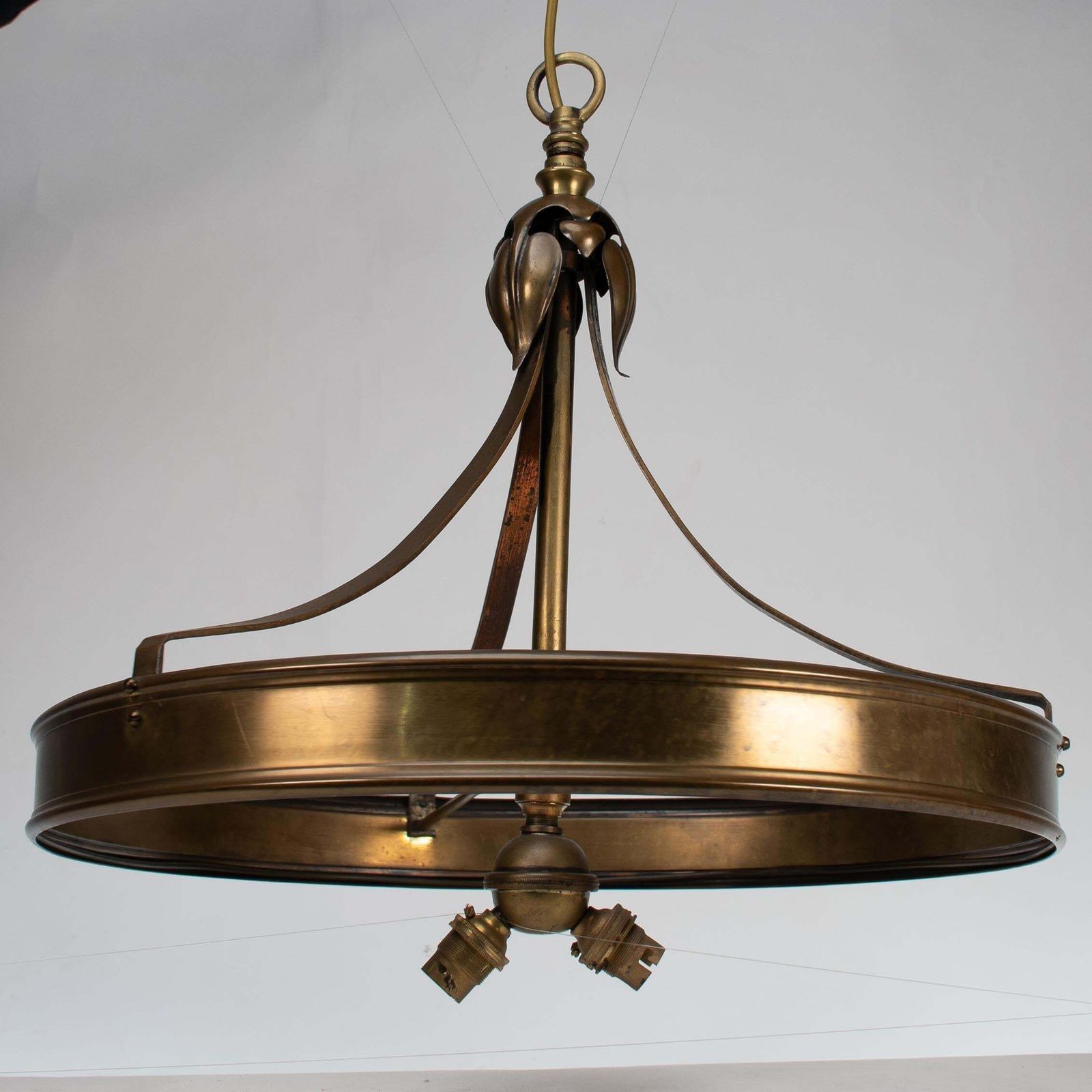 An Arts & Craft Ceiling Light With Stylized Petals & A Circular Brass Ring photo furniture