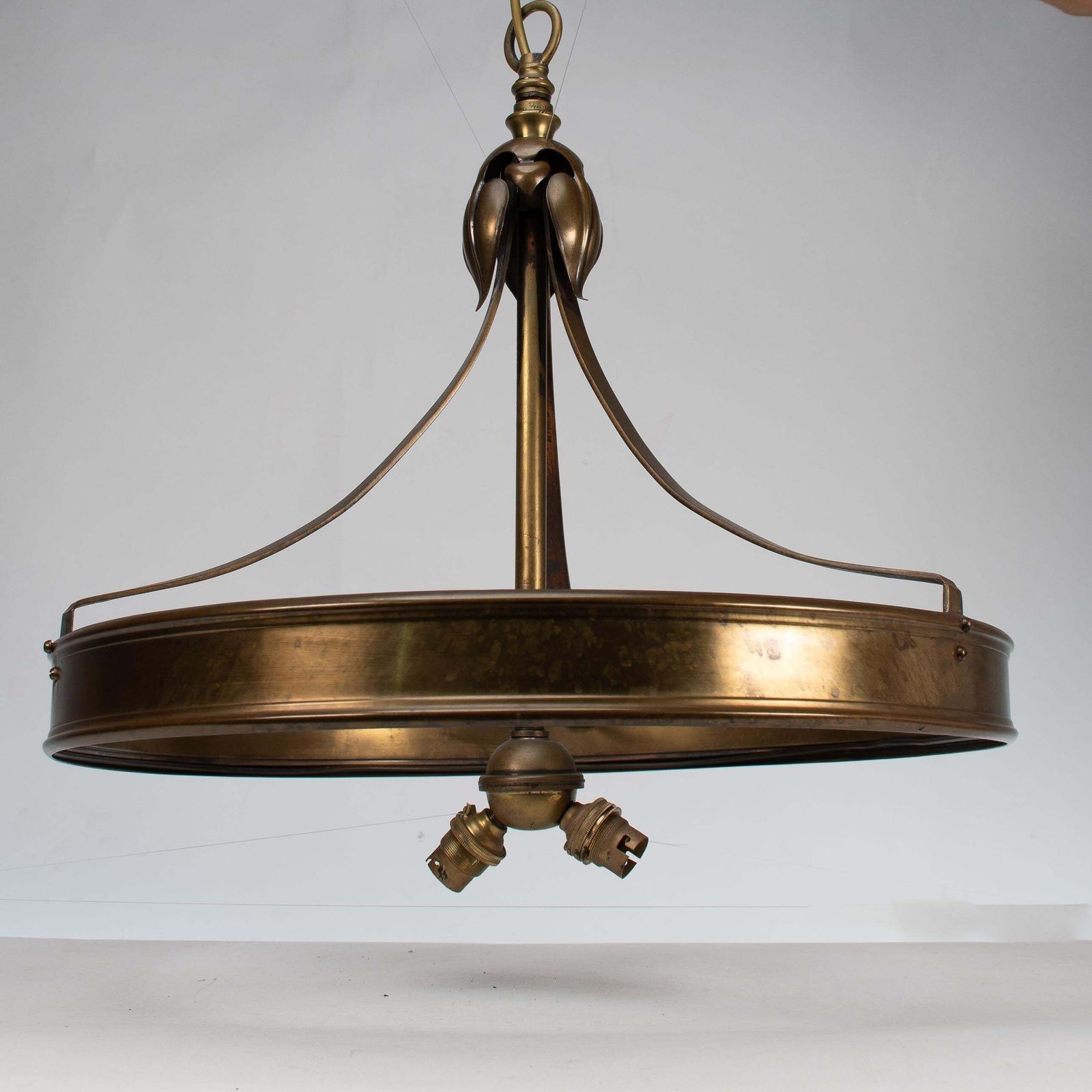 An Arts & Craft Ceiling Light With Stylized Petals & A Circular Brass Ring photo Lighting