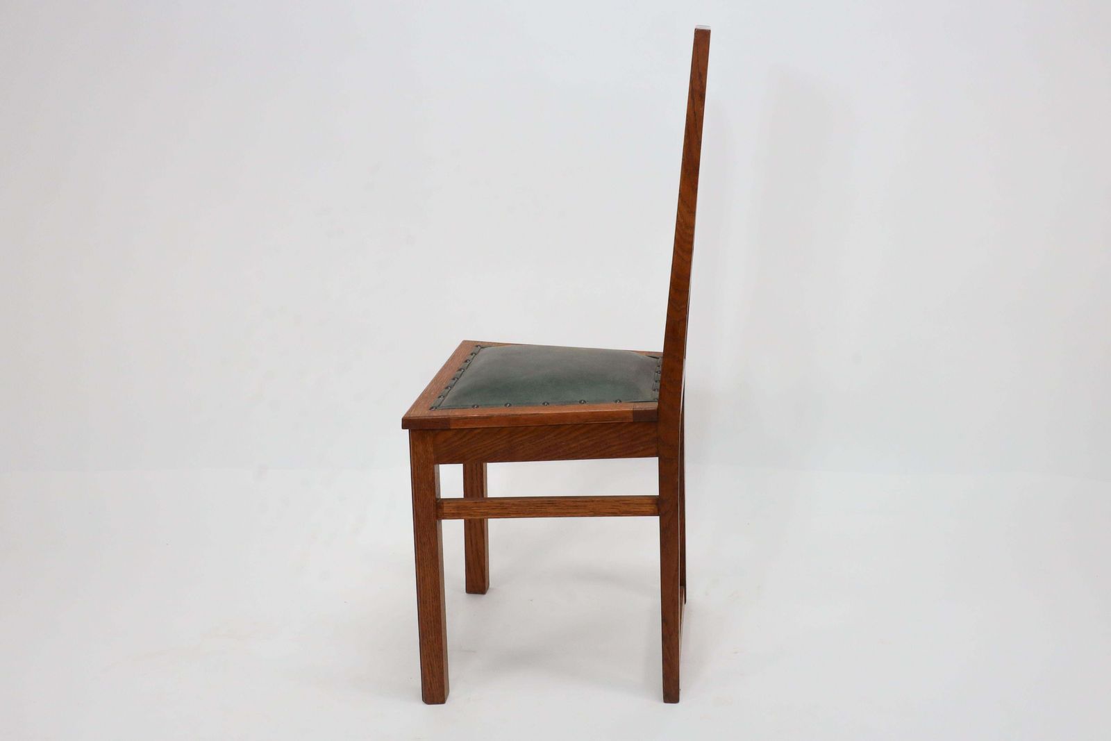 E A Taylor. A Set Of Five Arts And Crafts Oak Side Chairs With Heart Cut Outs. photo buy