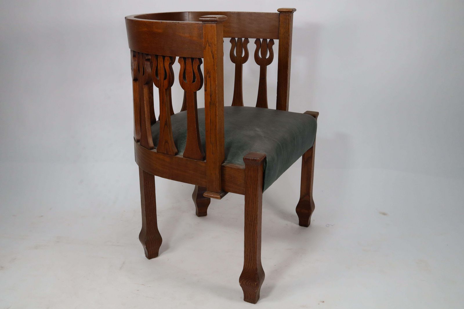 An Arts And Crafts Oak Armchair With Stylized Floral Upright Decoration photo Furniture