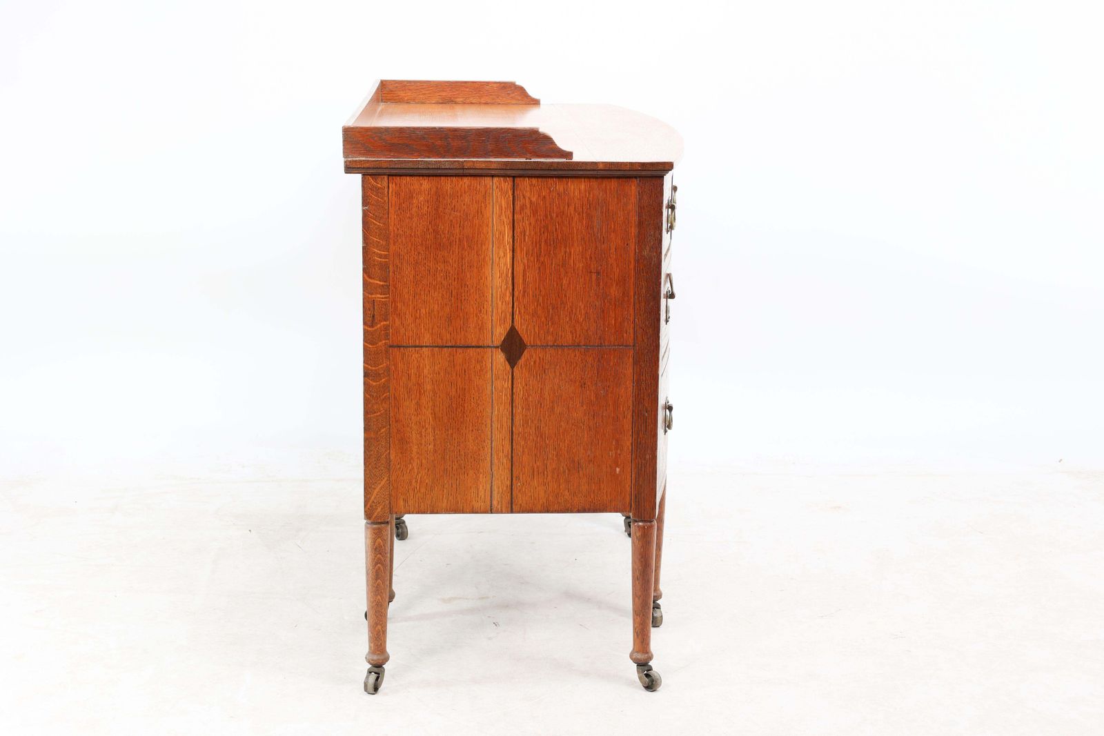Waring And Gillow. An Arts And Crafts Bow Fronted Kneehole Twin Pedestal Desk photo vinterior
