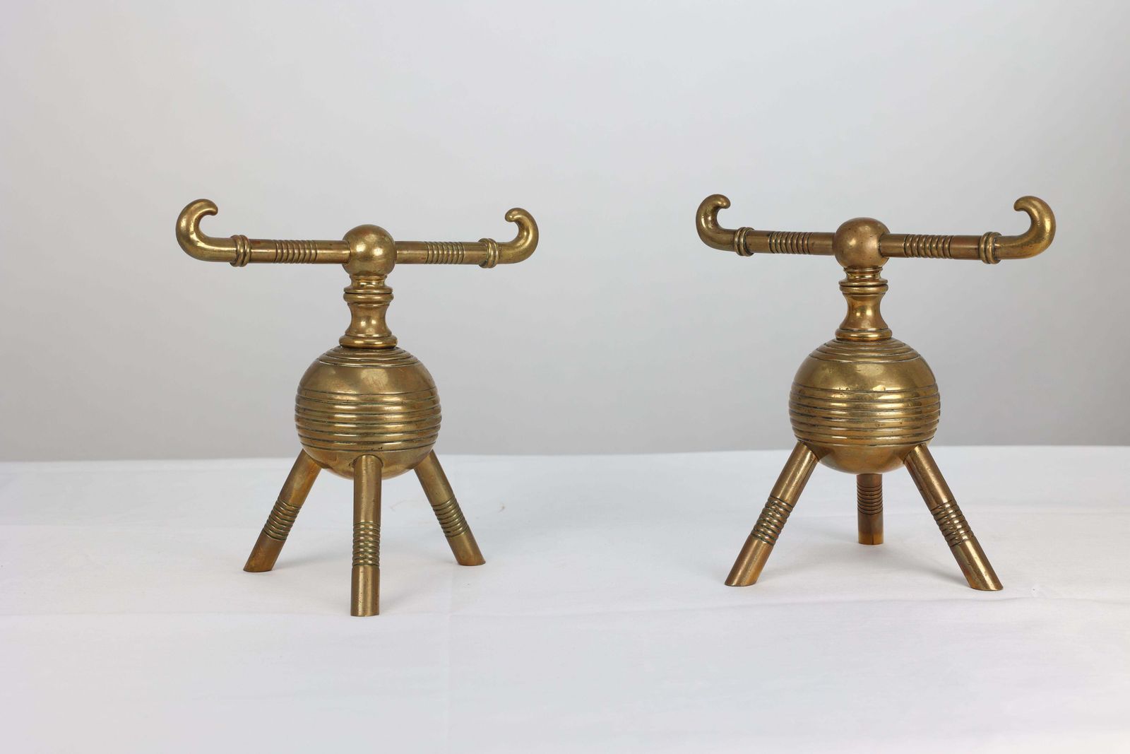 DR Christopher Dresser For Benham And Froud. A Pair Of Brass Fire Dogs photo for sale
