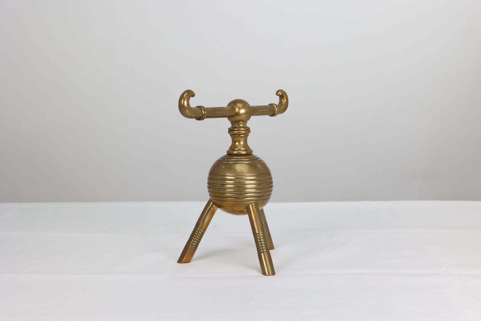 photo furniture DR Christopher Dresser For Benham And Froud. A Pair Of Brass Fire Dogs