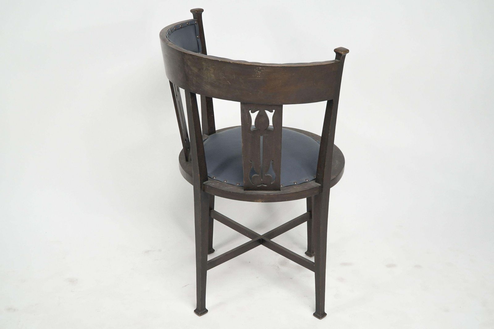 An Arts And Crafts Mahogany Tub Chair With Stylized Floral Cut Outs photo 1836.0