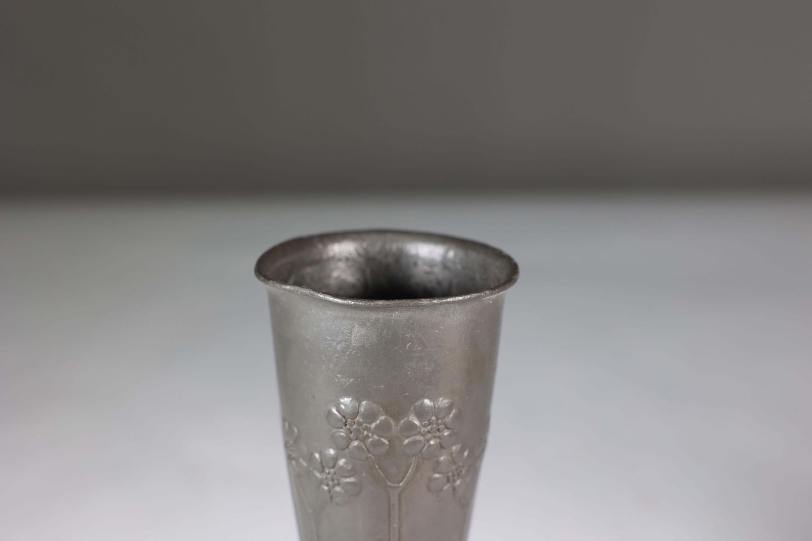 561.0 Liberty And Co. A Pair Of Tudric Pewter Vases photo